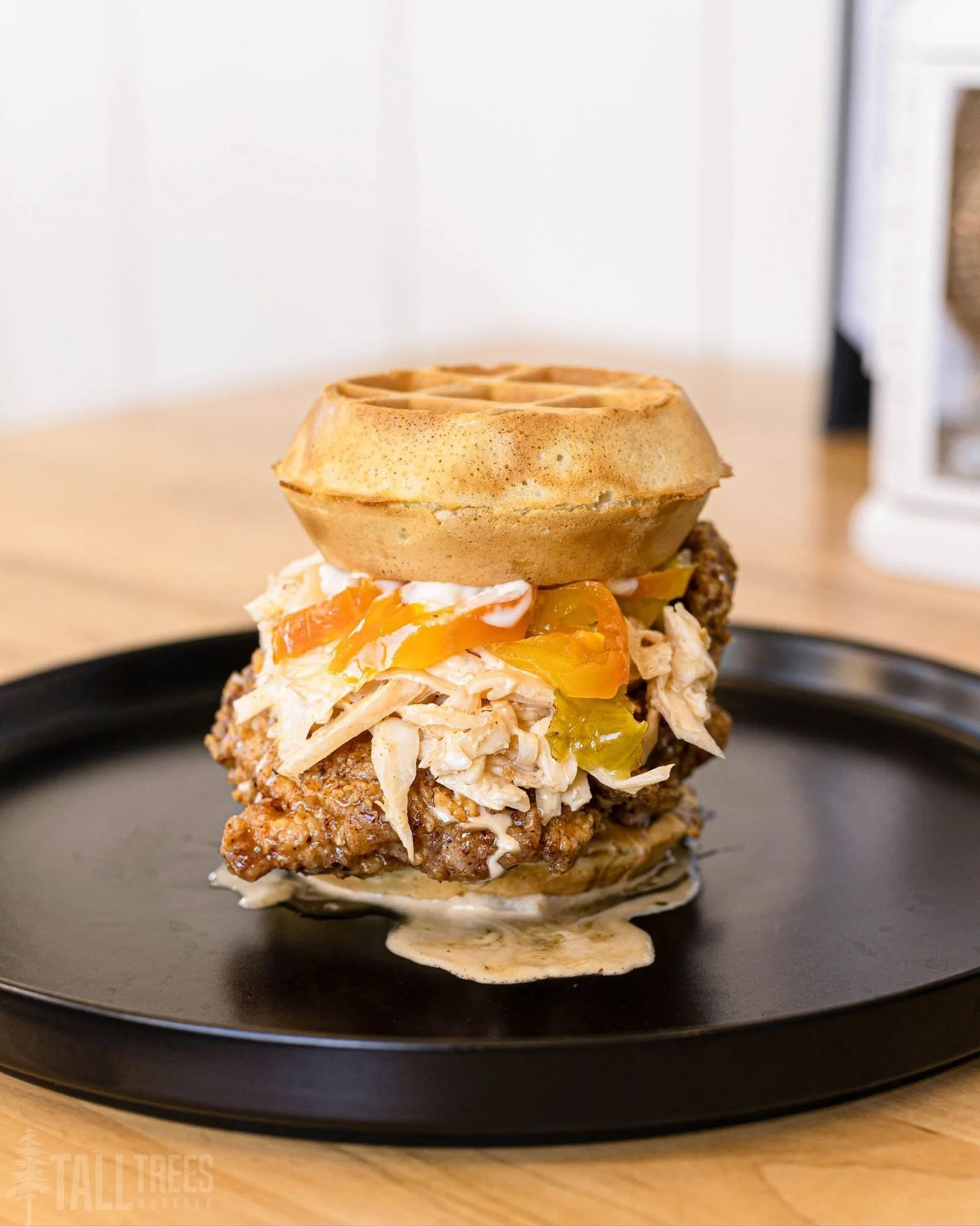 Sweet, savoury, spicy, crispy and creamy, our Buttermilk-Fried Chicken and Waffle Sandwich is filled with nuanced flavour! 

Reserve your table online: Link In Bio&uarr;

📍 Tall Trees is located at 87 Main St W, Huntsville
📲 (705) 789-9769

Tall Tr