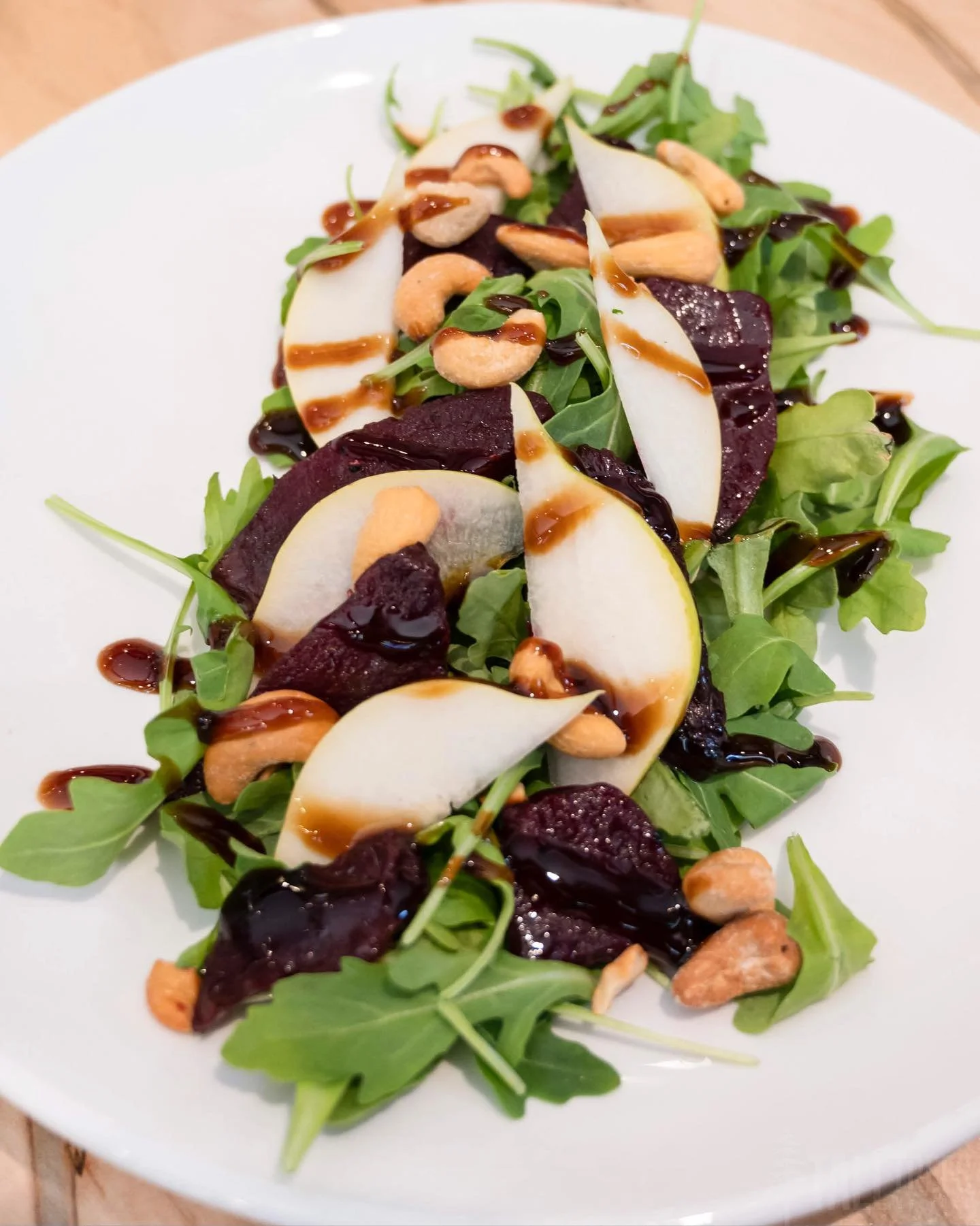 Our Roasted Beet &amp; Balsamic Salad is a colourful and flavourful start to any meal.

Tender roasted beets, marinated in tangy balsamic, are paired with juicy pear and crunchy cashews, all atop fresh arugula, for a crisp, delicious salad. 

Reserve