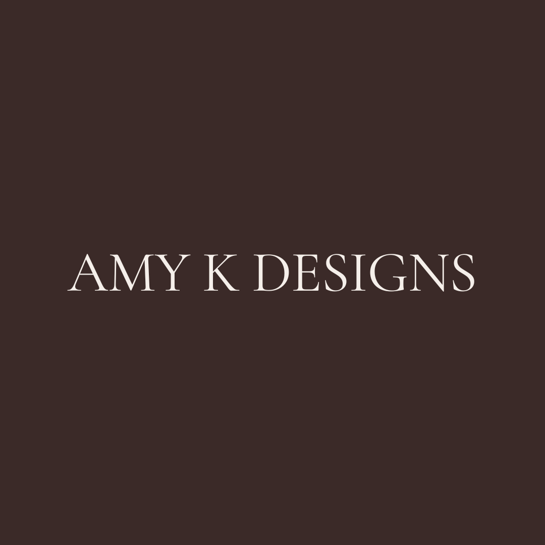 Brown background with white text that reads 'AMY K DESIGNS'