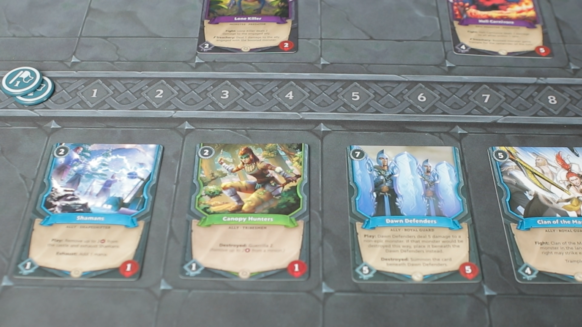 Pay mana to play cards in rows to defend against the horde!
