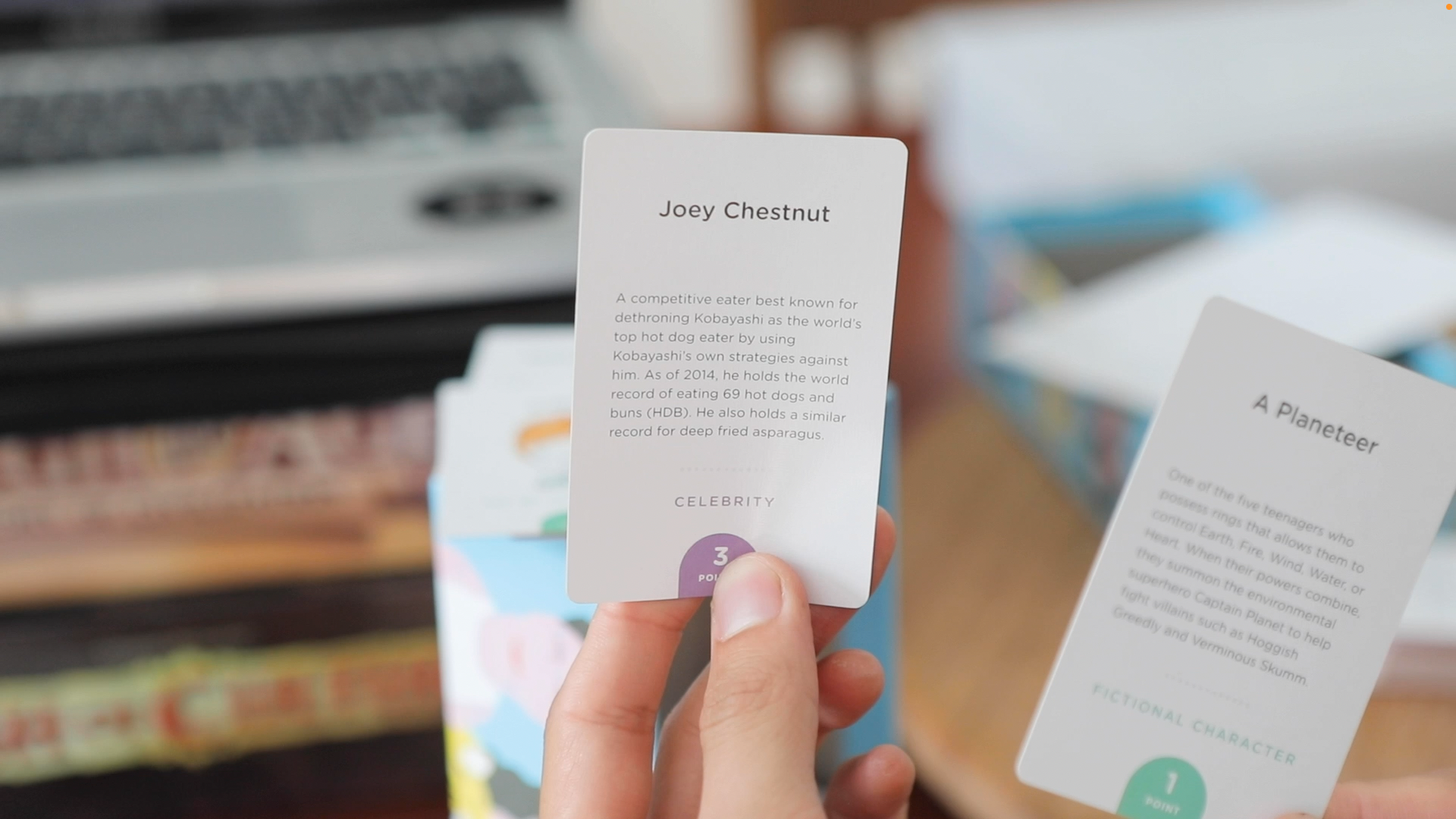 Read a card, give some clues.