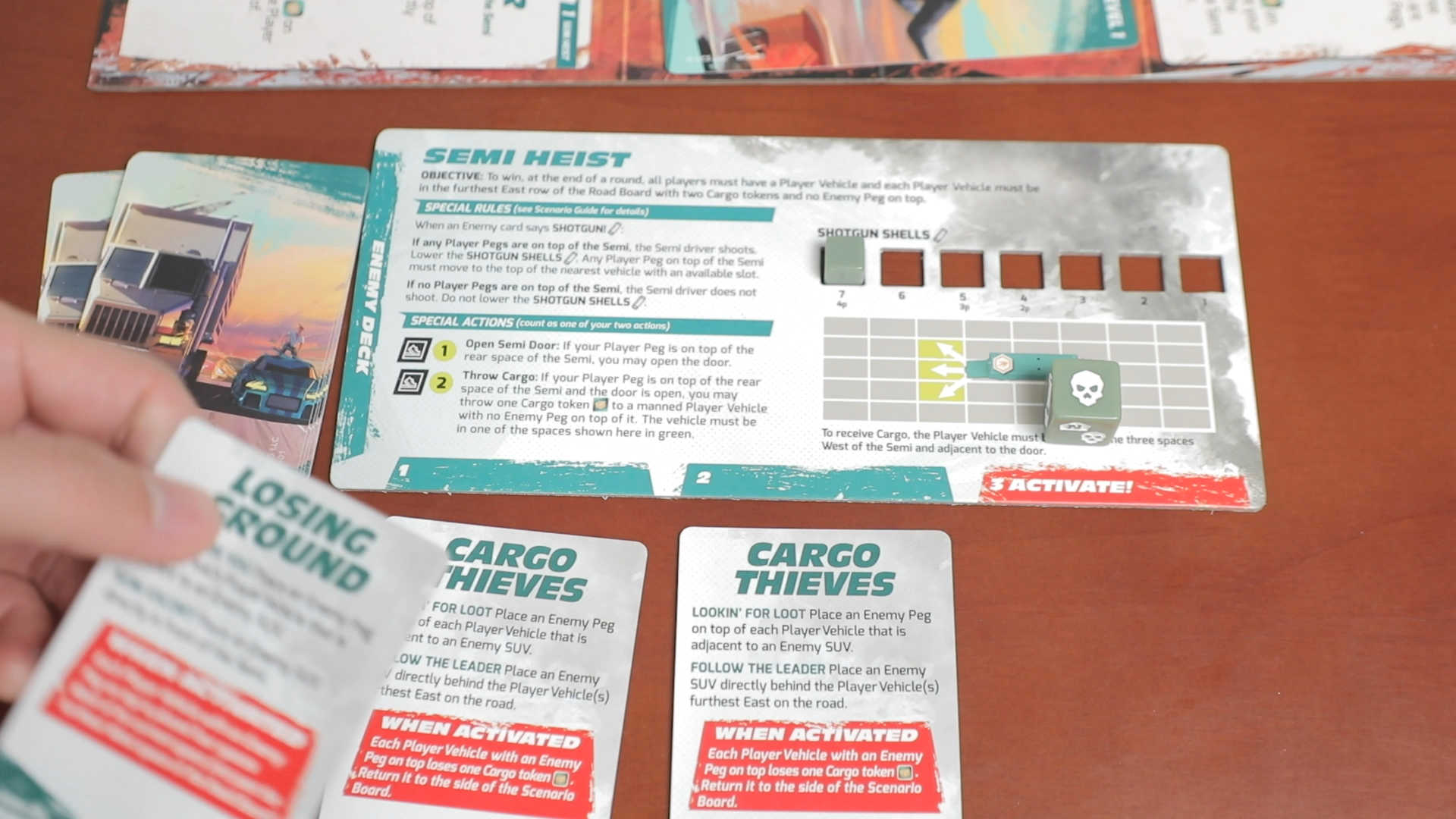 3 sets of unique scenario cards and boss traits!