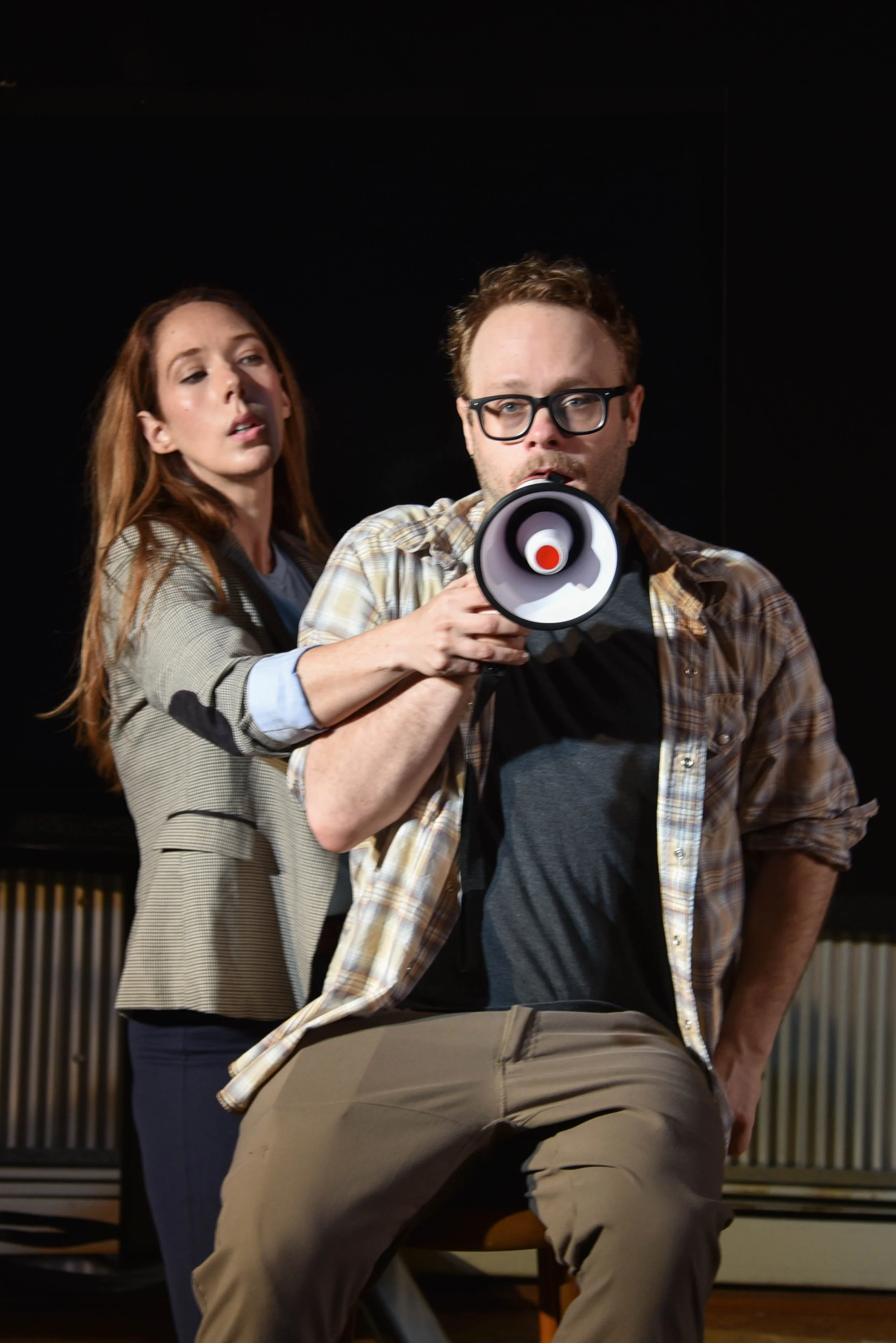 Liz encourages Ben to finally explain what art is. (Photo by Jeff Burkle)