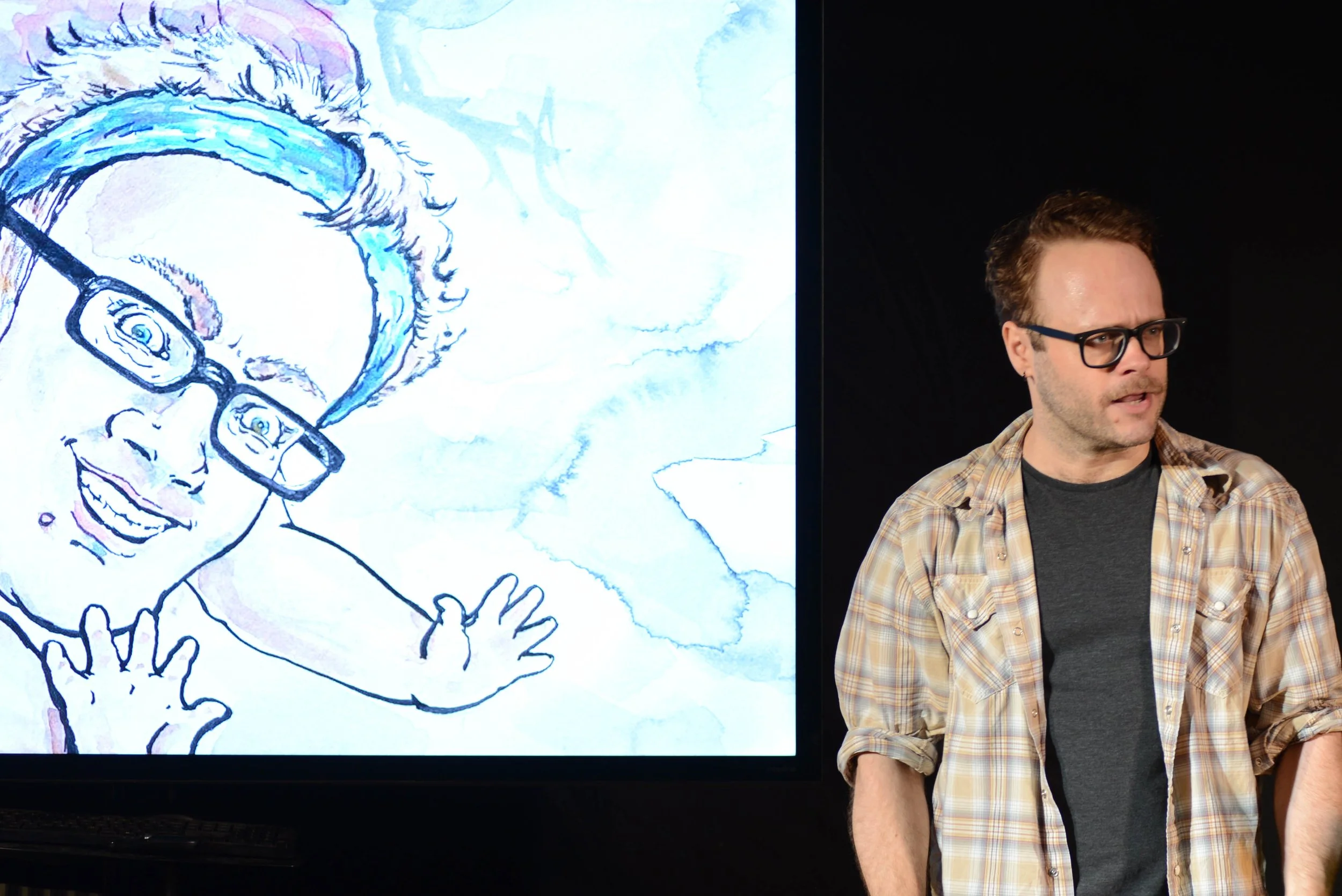 Ben hates how he looks in photos but loves his depictions in ACTUAL art. (Photo by Jeff Burkle)