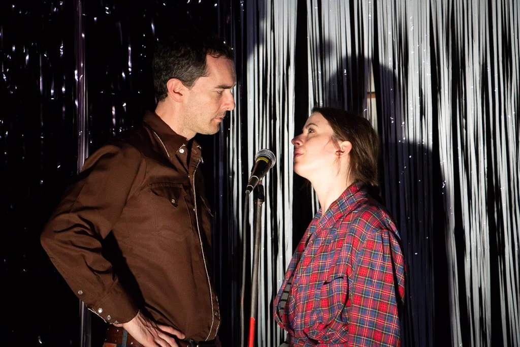 In Kate's dream, Mr. Allen (Dylan Shelton) encourages her to go on stage and perform, even if her sister is nowhere to be found. [Photo by Diana Cárdenas]