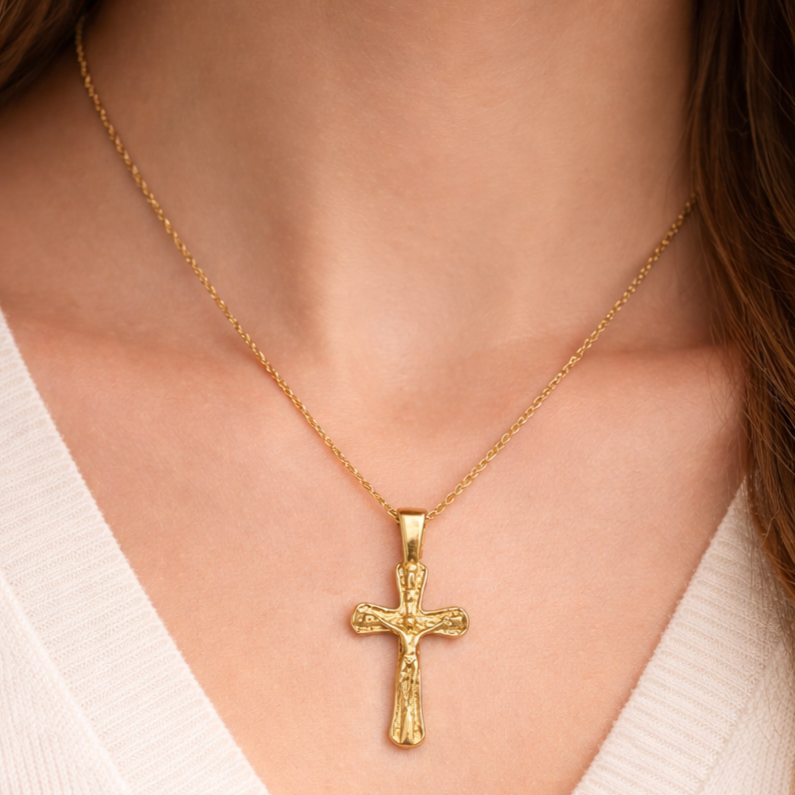 Gold+crucifix+necklace+close-up.png