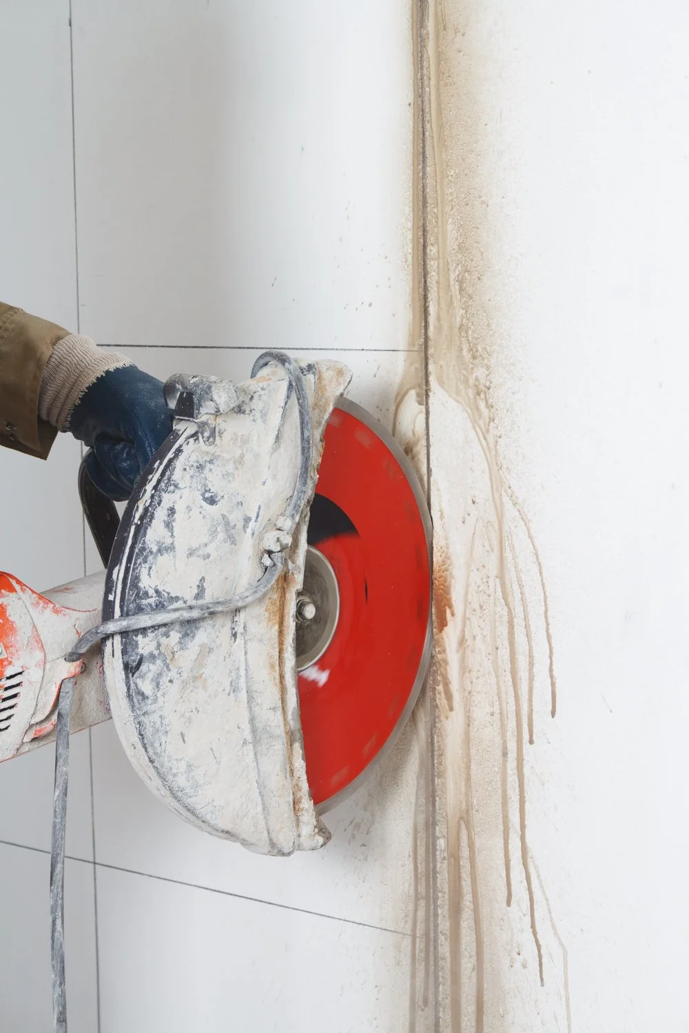 Concrete cutting in progress on a Newcastle wall