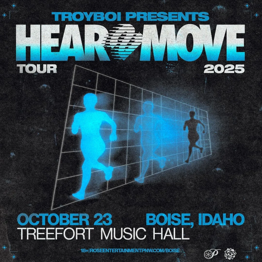 Event poster for TroyBoi presents Hear & Move Tour 2025, taking place on October 23 in Boise, Idaho at Treefort Music Hall. The poster features a futuristic digital design with three running silhouetted figures inside a grid, and a stylized heart with motion lines in the word 'HEAR.'