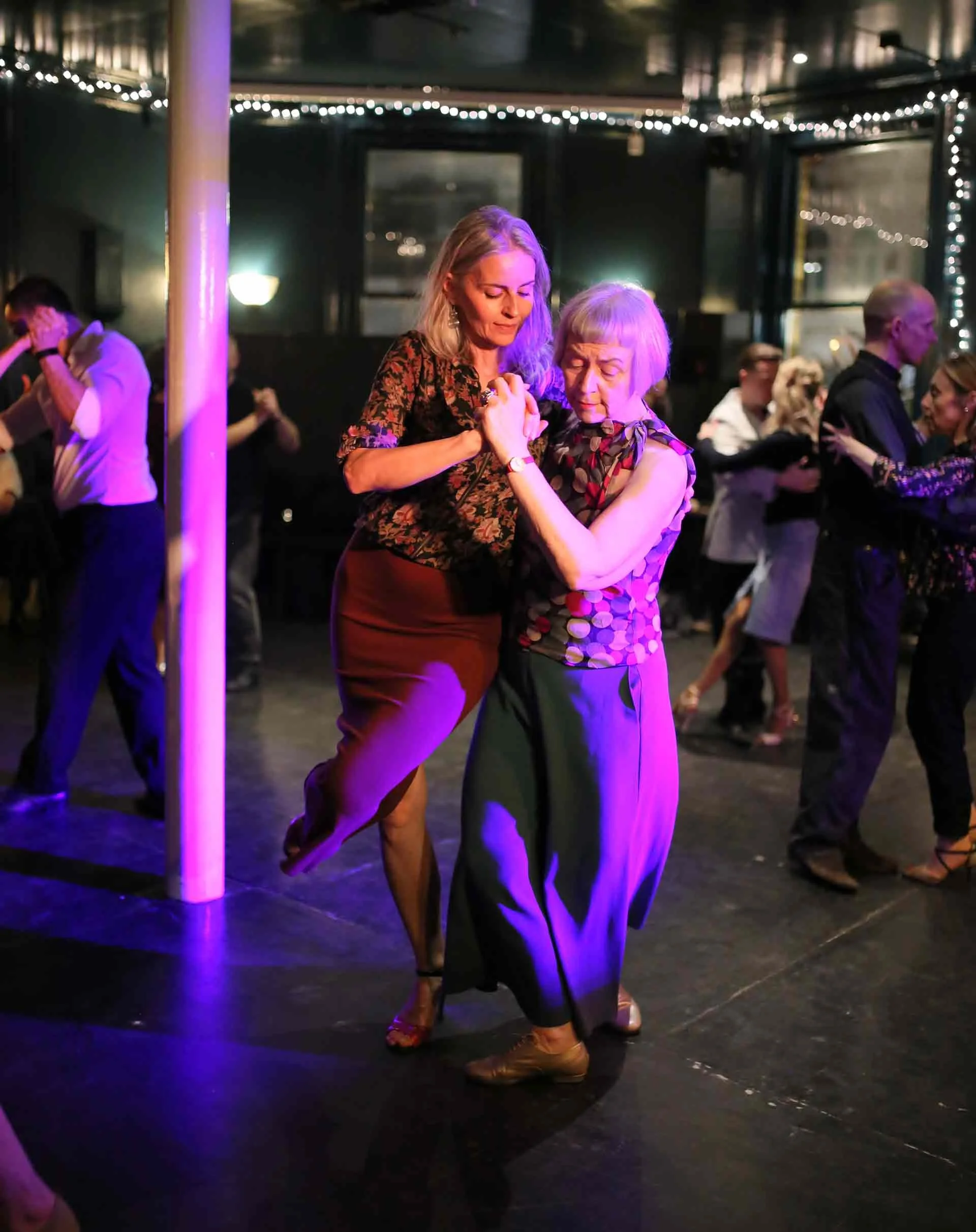 Ursula and Kate dancing joyously in Tango 178 