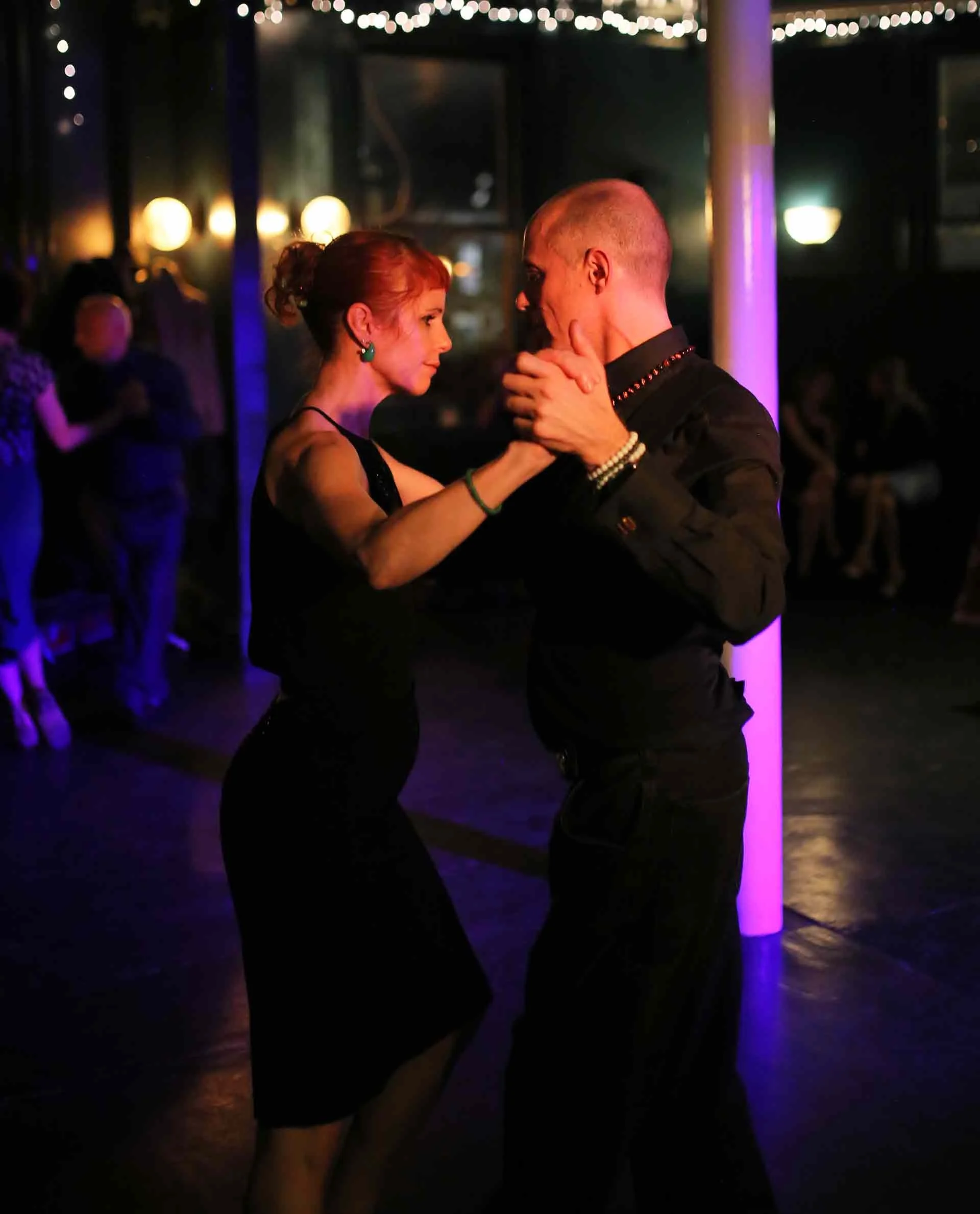 Si and Emily organisers of Tango 178 London tango classes dancing in The New Cross House, an event that runs every Sunday