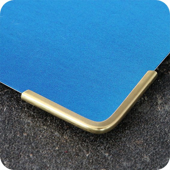 corner protectors | Protective corners for book plates. And not just golden.