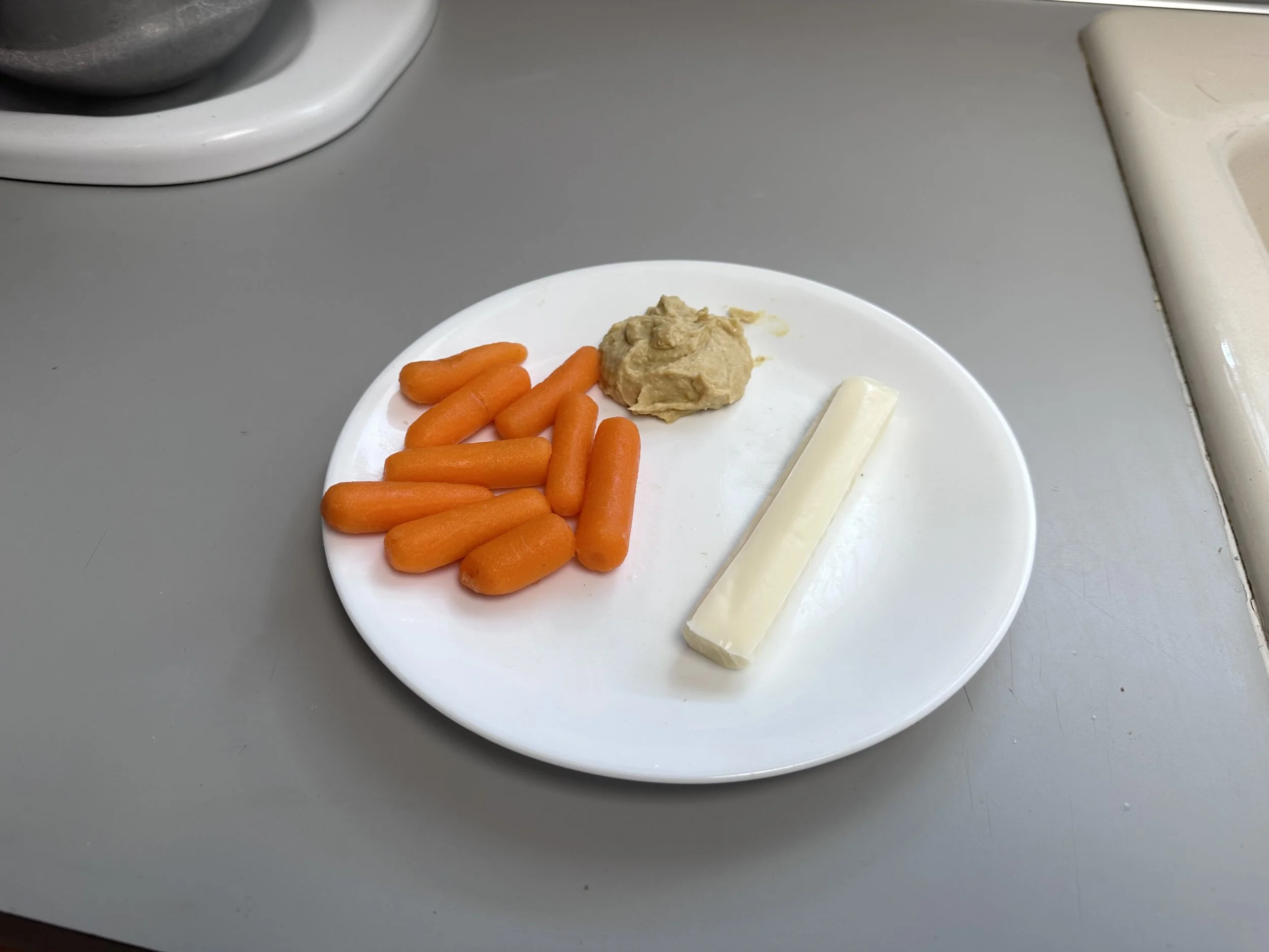 SNACK: Carrots, Cheese Stick, and Hummus