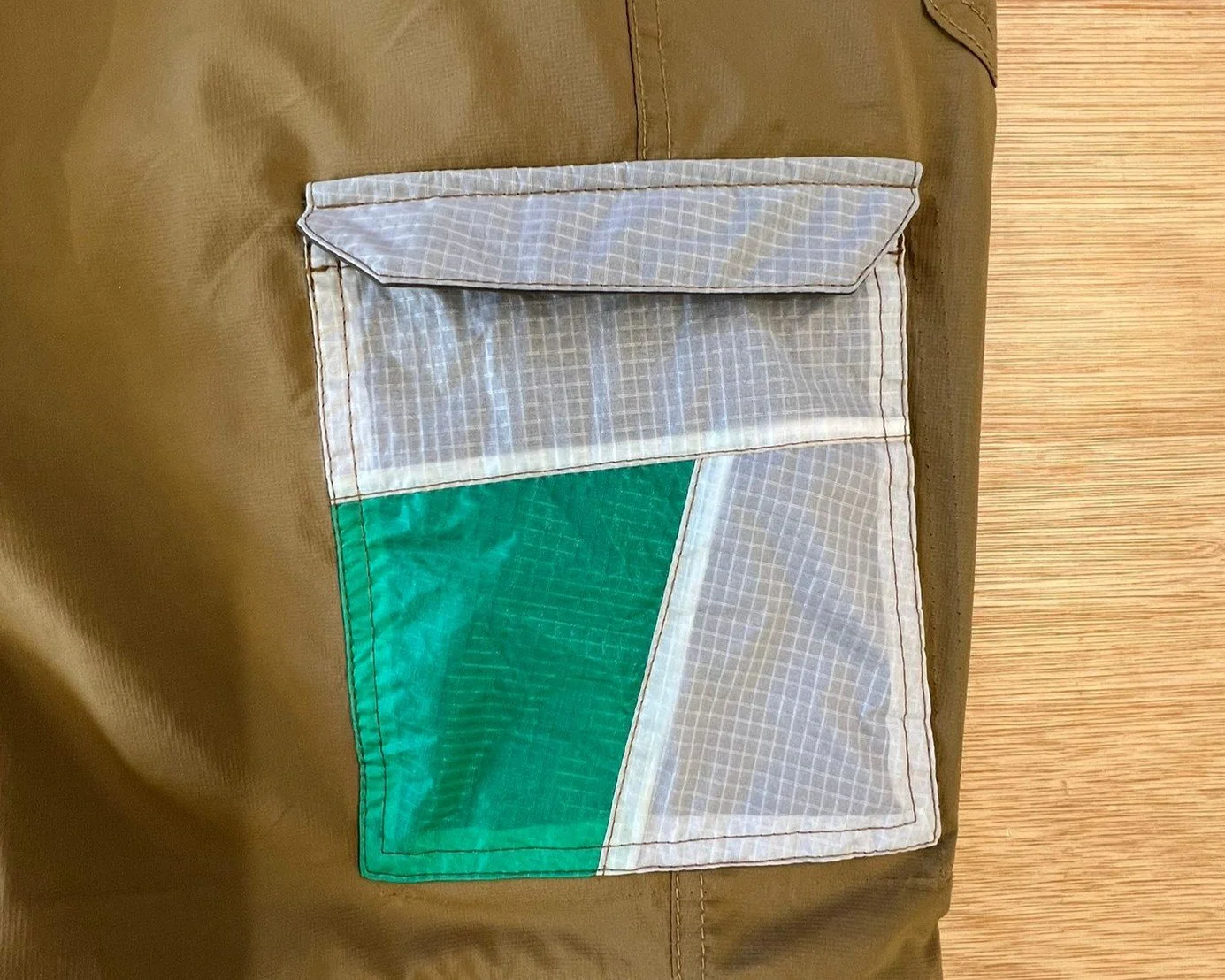 Custom cargo pocket for hiking trousers, made of colourful paraglider