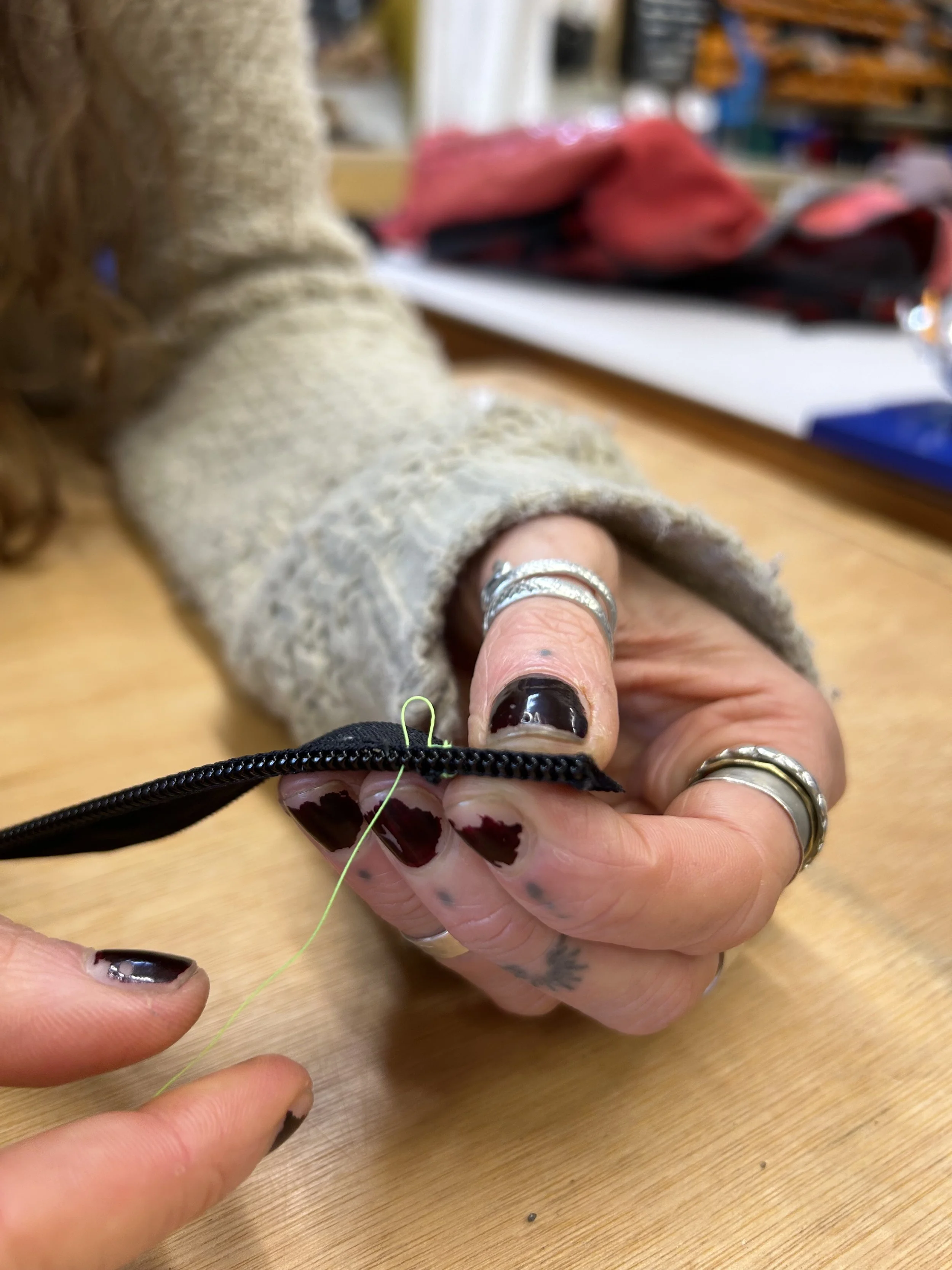 hand-sewing-zip-repair.jpeg