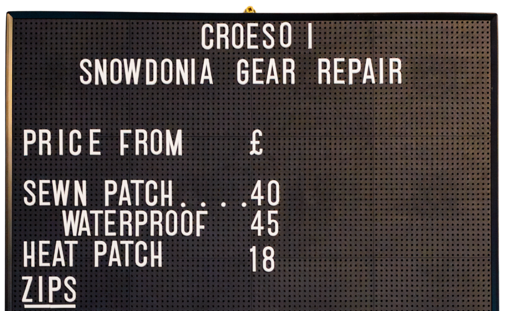 price board at snowdonia gear repair workshop