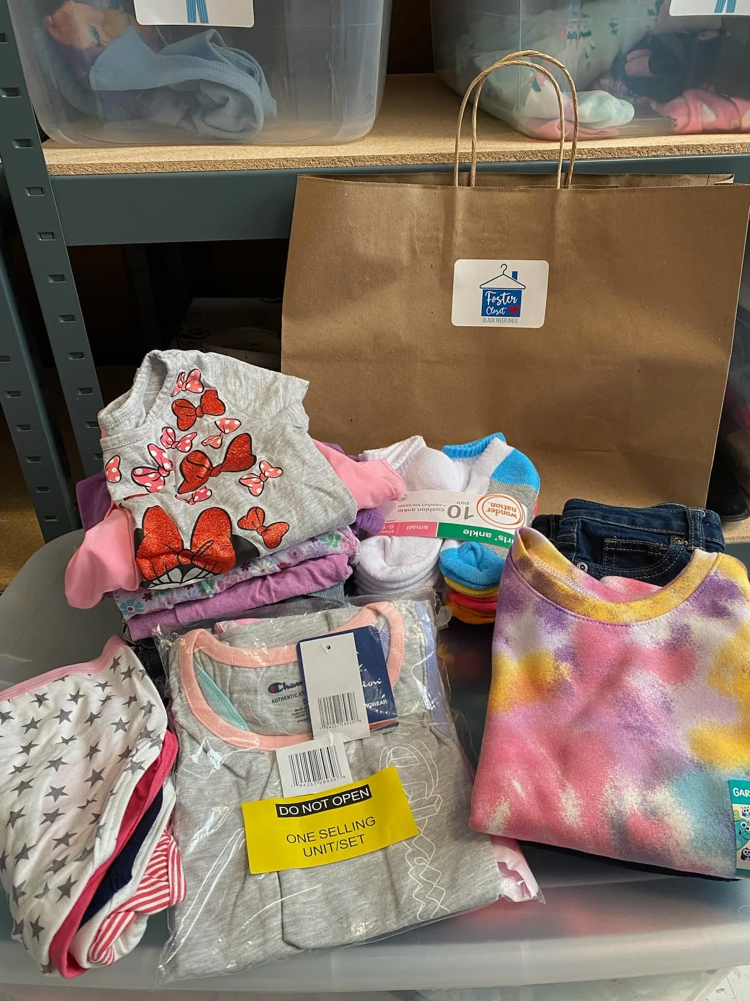 Packing bags of summer clothes.