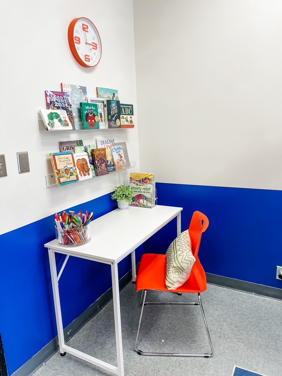 The desk provides a place for kids to color or do school work. It's also available for case managers to use while they're in the Lily Pad.
