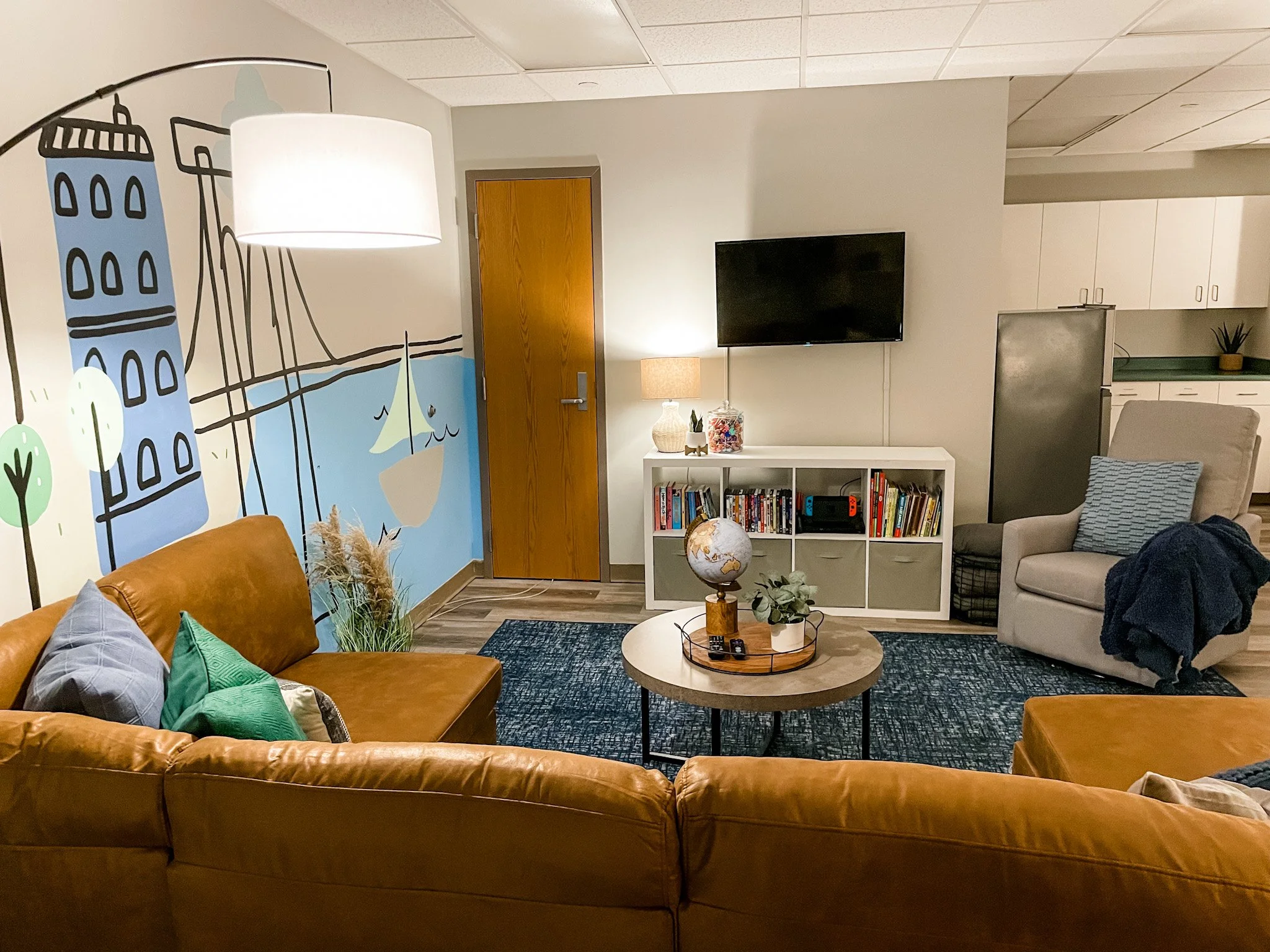 A rocker/glider, weighted blankets, and our lollipop jar are tools to help case managers find ways to help children with Sensory Processing Disorders. 