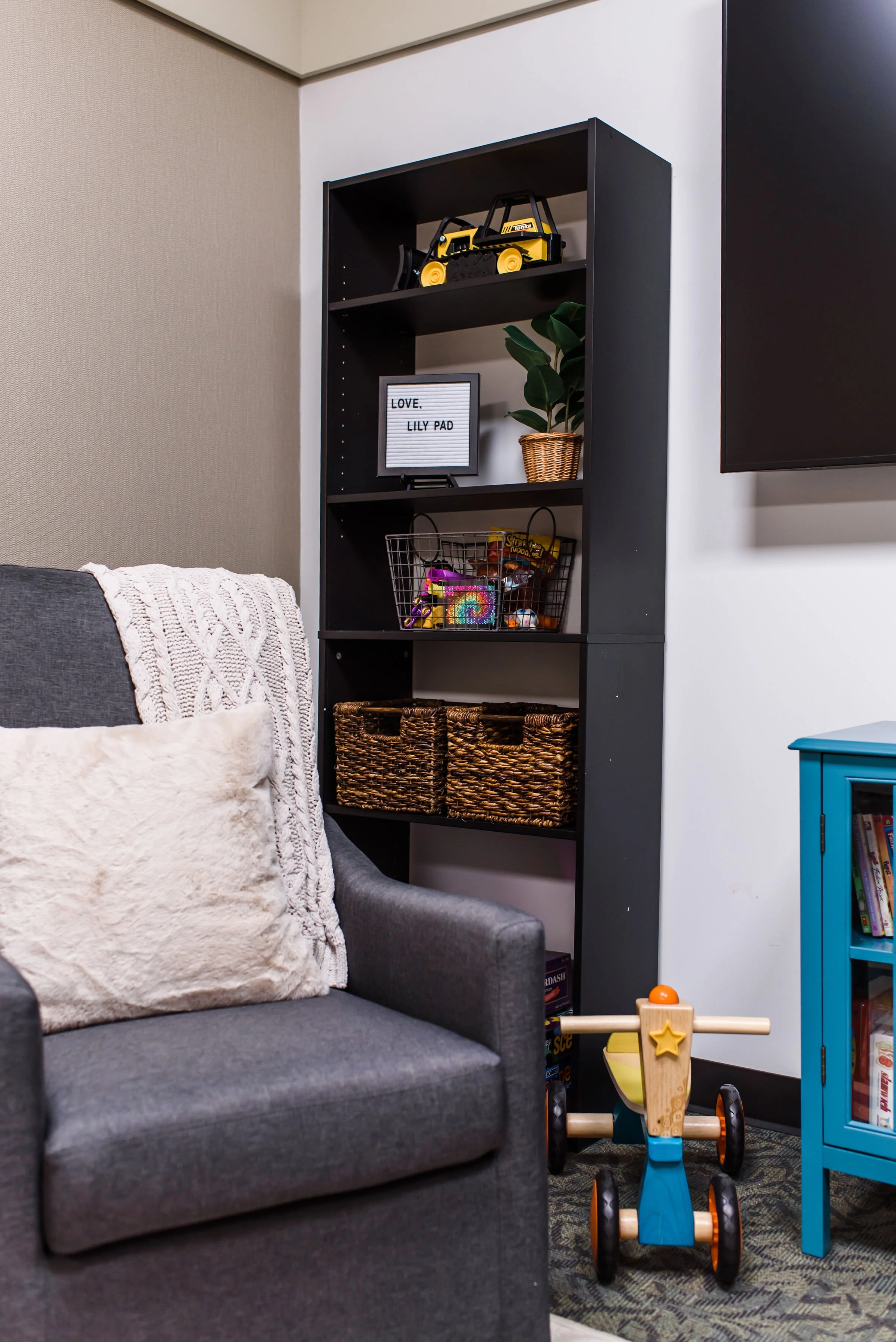 A rocker for comfort and toys for all ages.