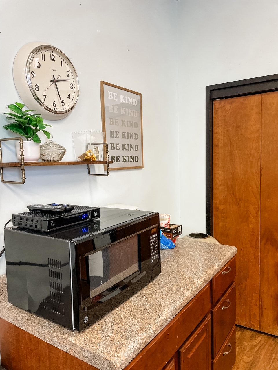 New wall decor makes this corner of the break room feel new!