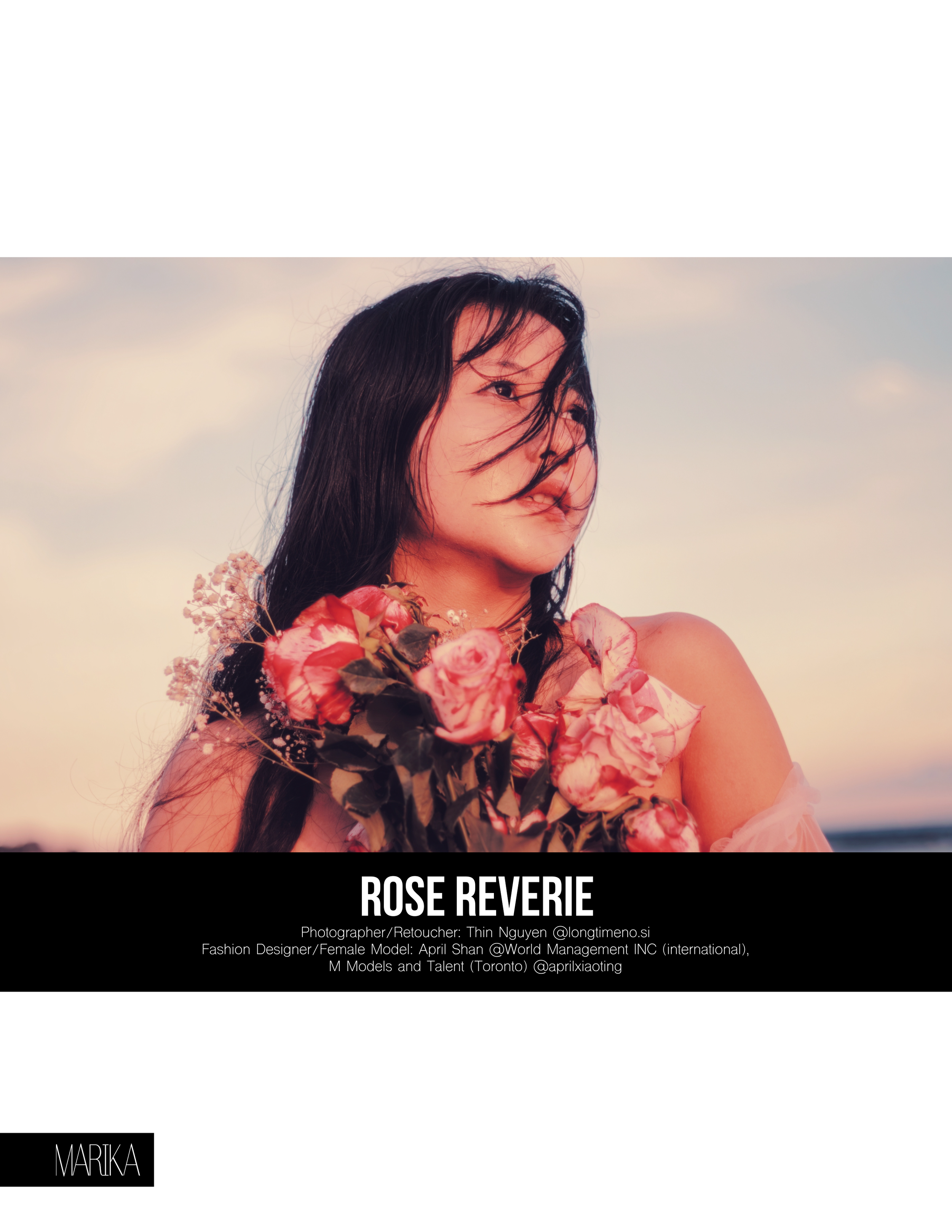 A woman with long black hair holding a bouquet of pink roses against a sunset sky.