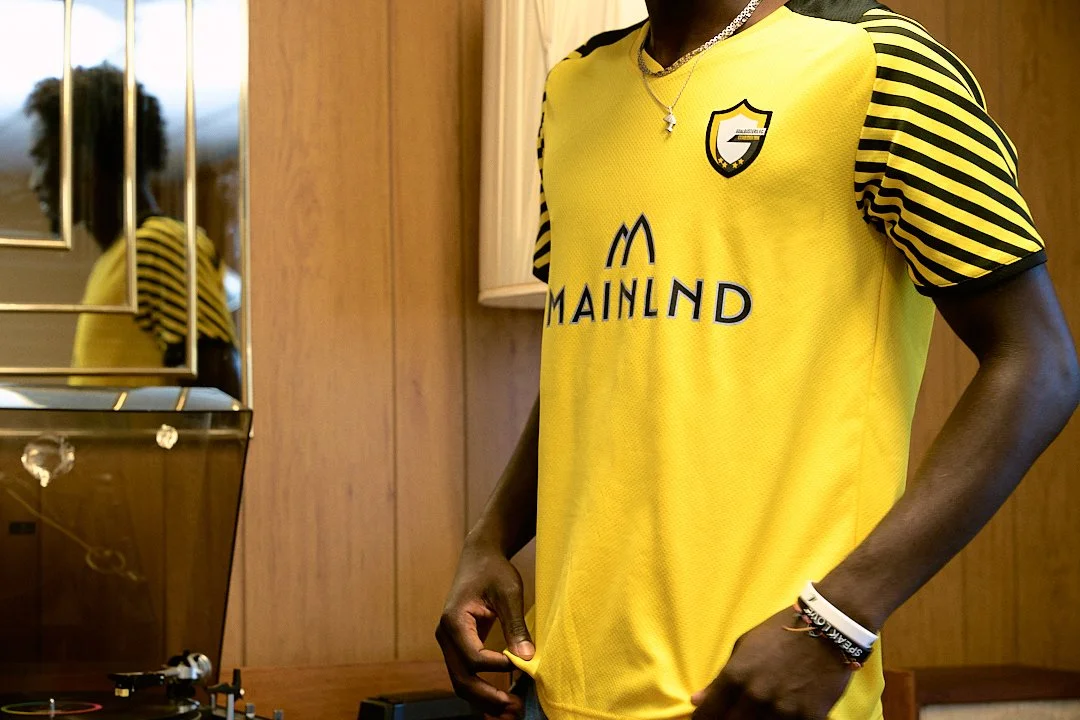 "Two hands shaking, symbolizing collaboration and teamwork, representing the concept of 'Partners in Progress' in a business or project context."