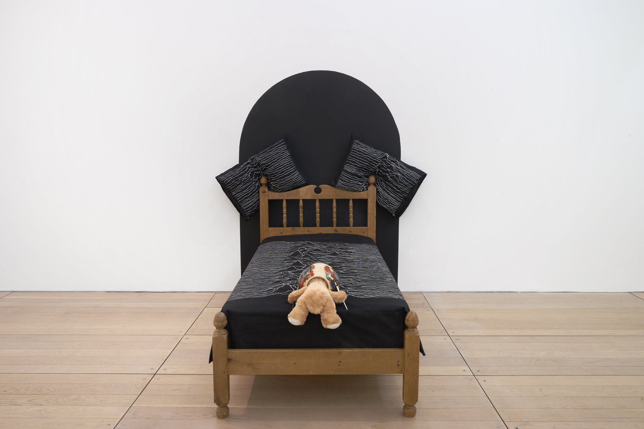 Well Known Pleasures, 2022, Wooden bed, Joy Division bed sheets, pillows and bear in ceramic pot, 204 x 100 cm, 80 x 40 in