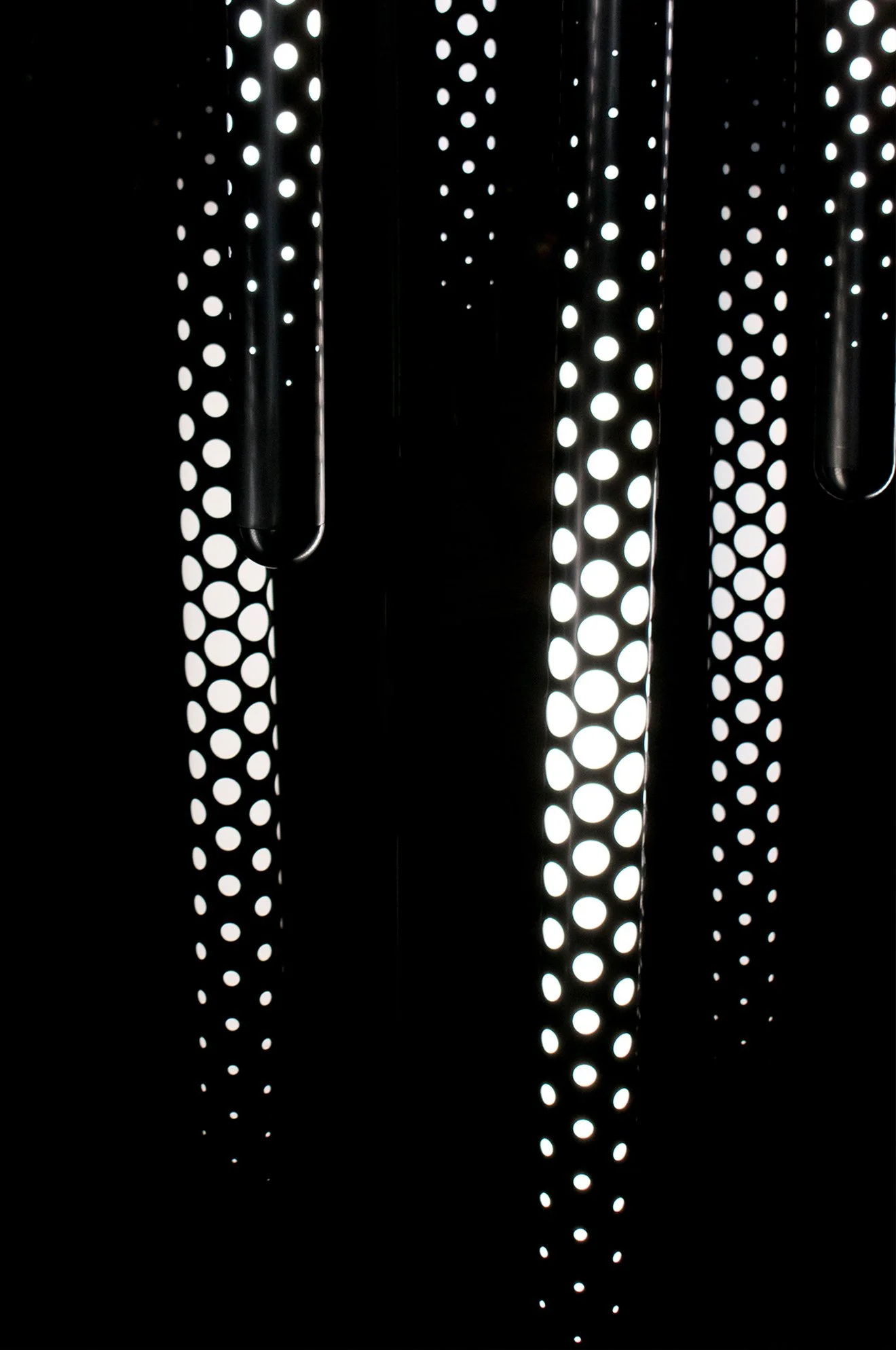 Tom Dixon black tube with white dots lighting.jpg