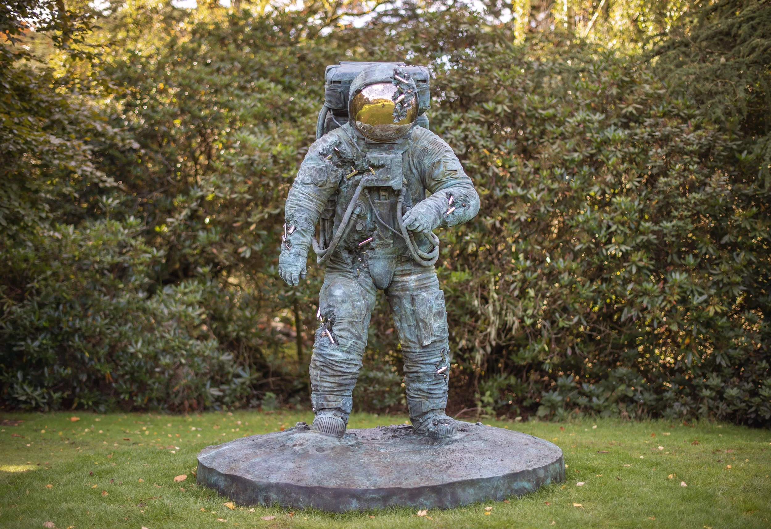 Daniel-Arsham-Bronze-Eroded-Astronaut-2022.-Installation-view-at-Yorkshire-Sculpture-Park.-Courtesy-Perrotin-Gallery-and-Arsham-Studio.-Photo-by-Anthony-DevlinGetty-Images-for-Daniel-Arsham_1.jpg