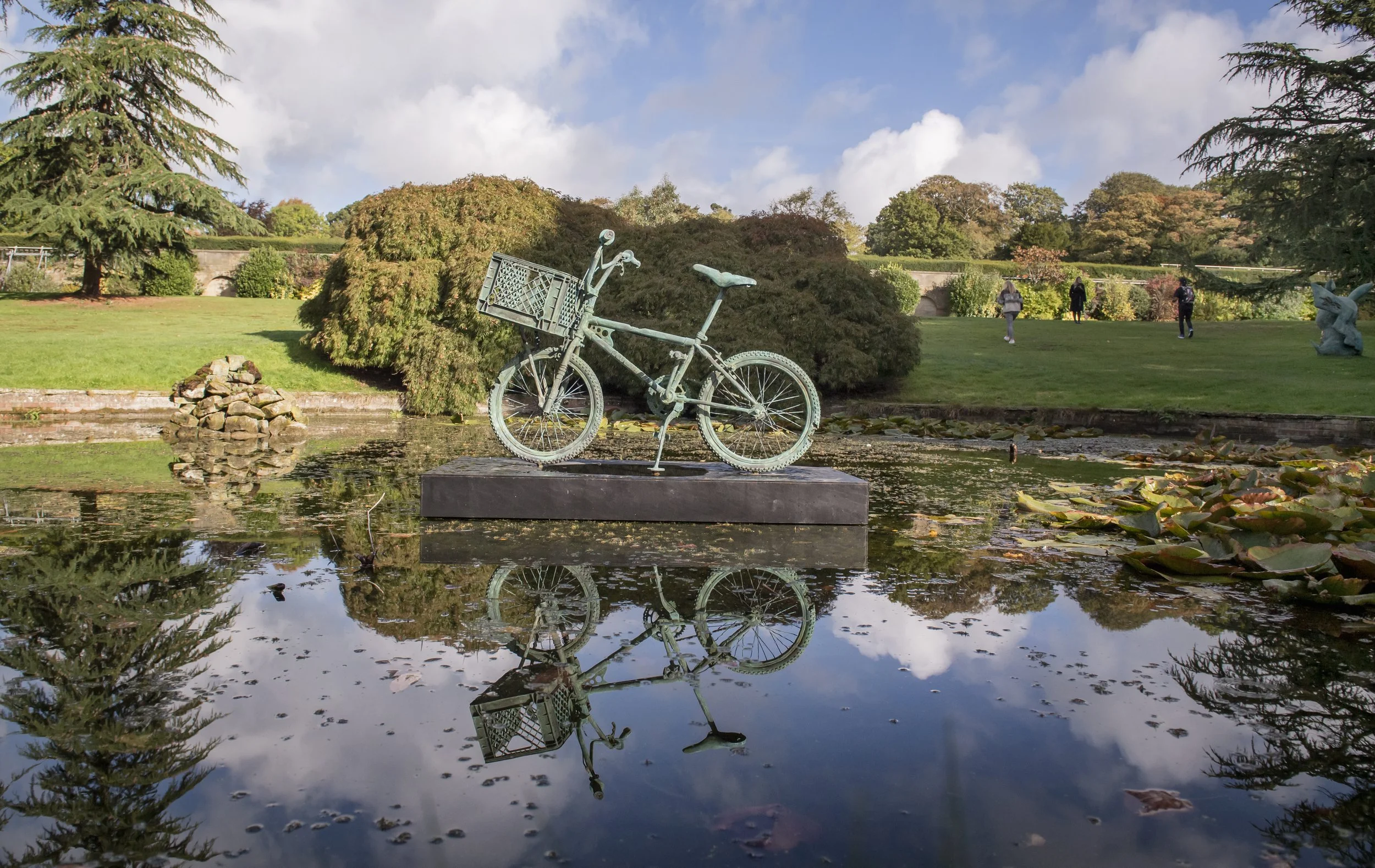 Daniel-Arsham-Bronze-Extraterrestrial-Bicycle-2022.-Installation-view-at-Yorkshire-Sculpture-Park.-Courtesy-Perrotin-Gallery-and-Arsham-Studio.-Photo-by-Anthony-DevlinGetty-Images-for-Daniel-Arsham_3.jpg
