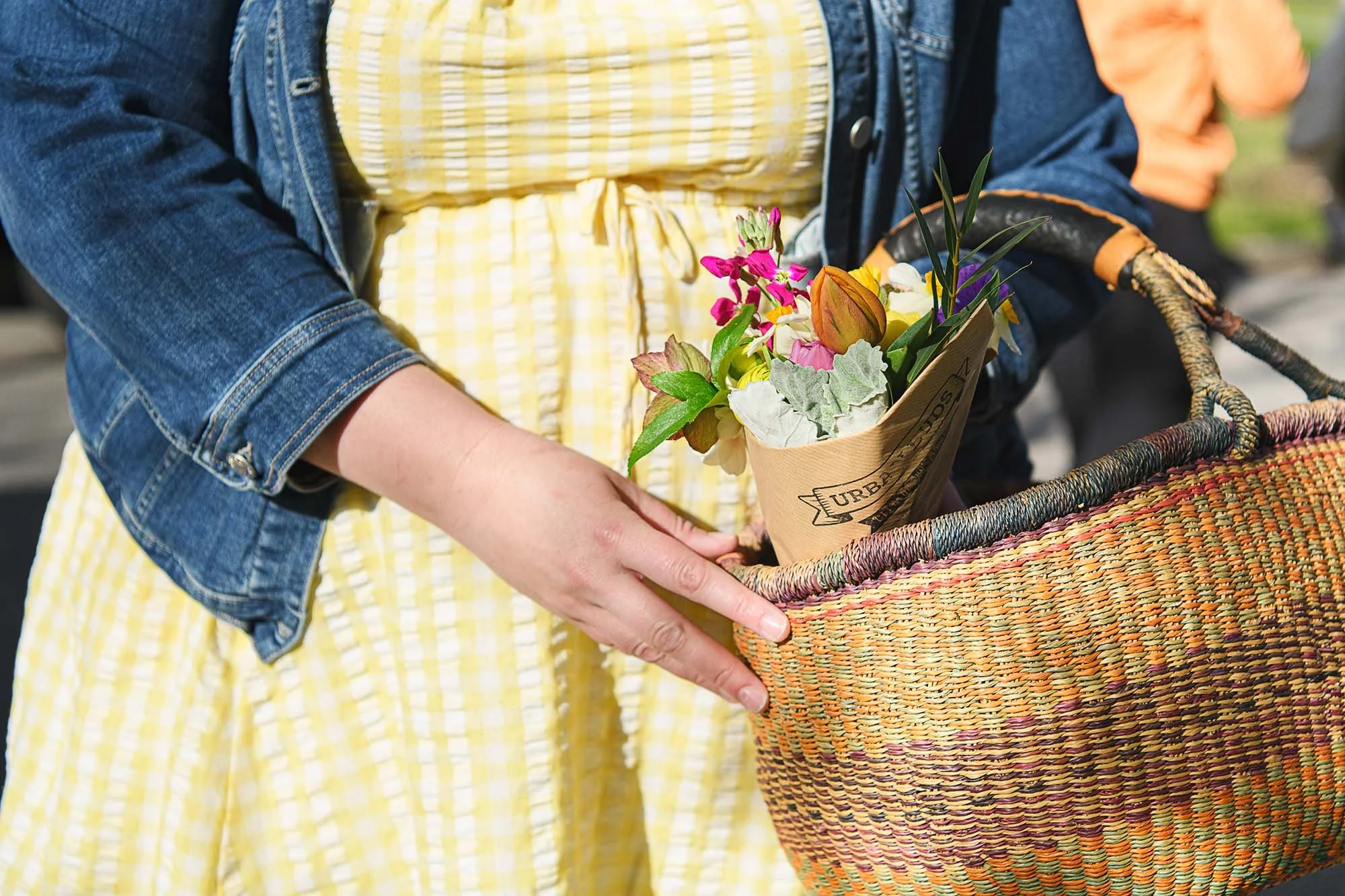 Flower photography of a beautiful bag holding flowers at a market. 