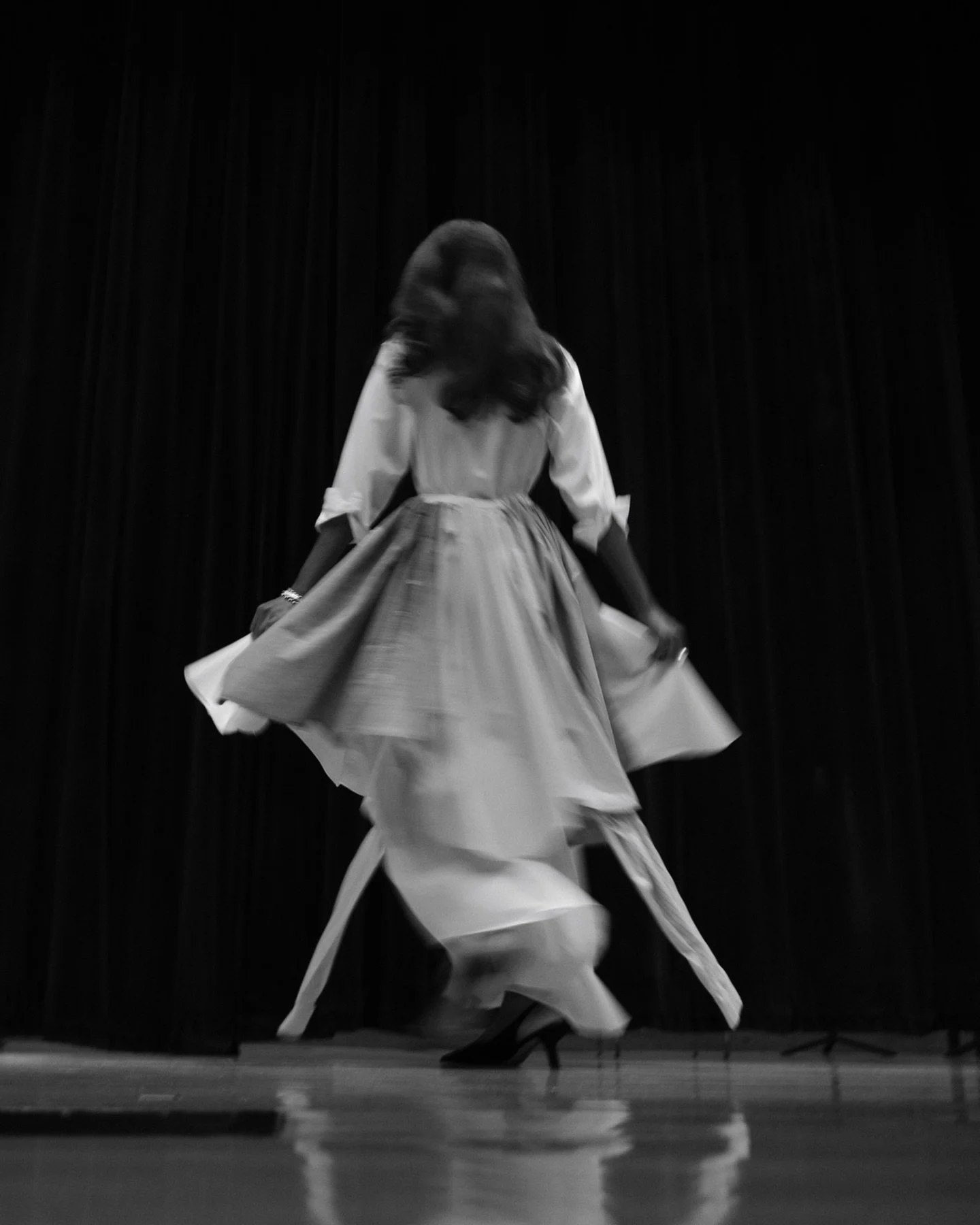 The tailoring of Brooks Brothers shirting is loosened and rearranged here into a gown. What was once created to structure the torso is remade for ease, movement, and creative self-expression.