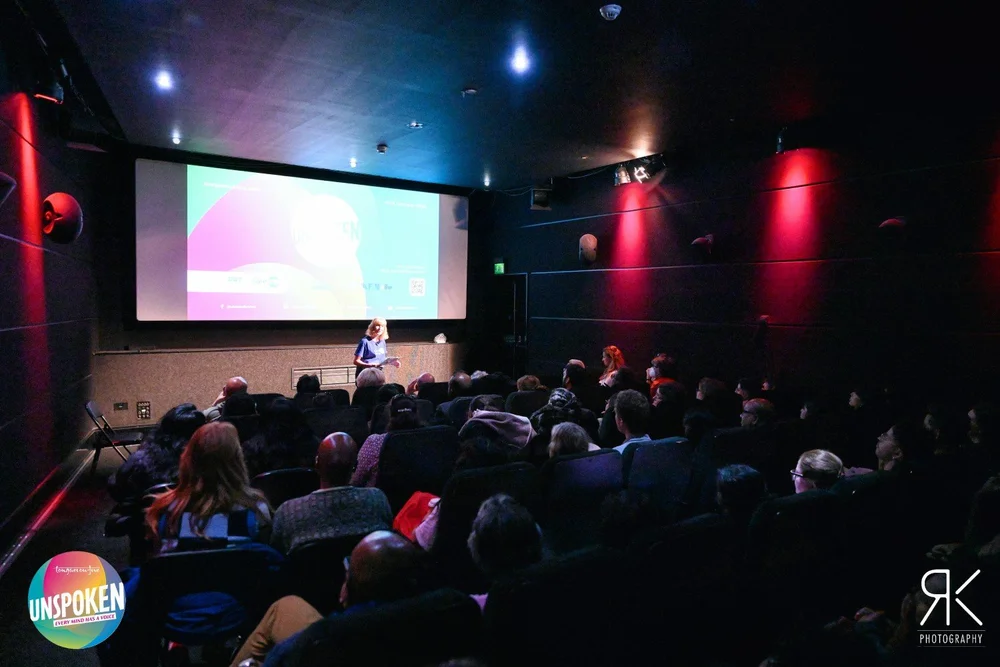 Rachel in front of screen with audience.jpg