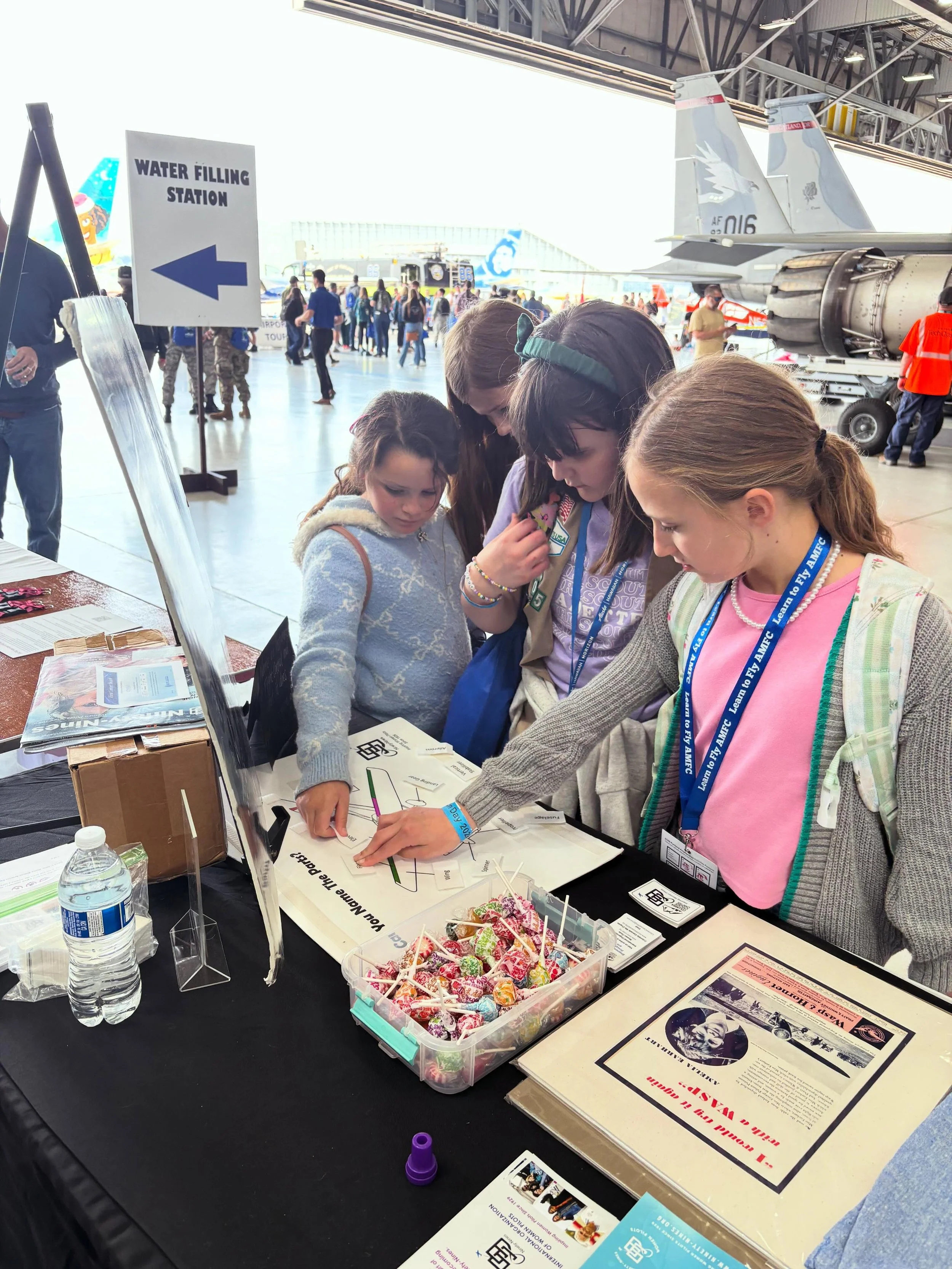 Another record year in the books at @alaskaair Aviation Day at PDX! Thank you to all our volunteers who came out to share our aviation passion and mission of the @theninetyninesinc. Education, scholarships and community. Catch us with glitter tattoos