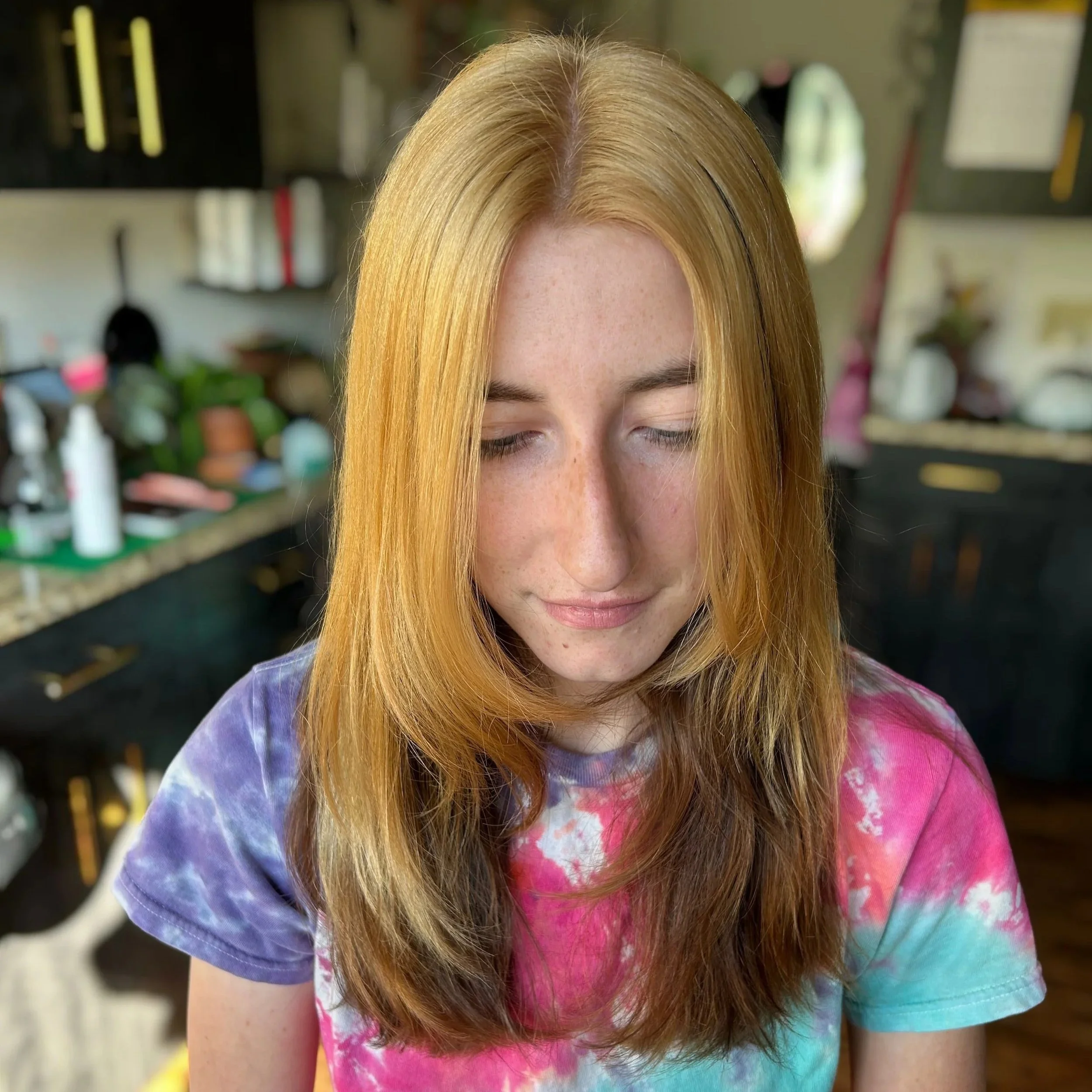 blonde two-tone hair minneapolis hairstylist layered haircut