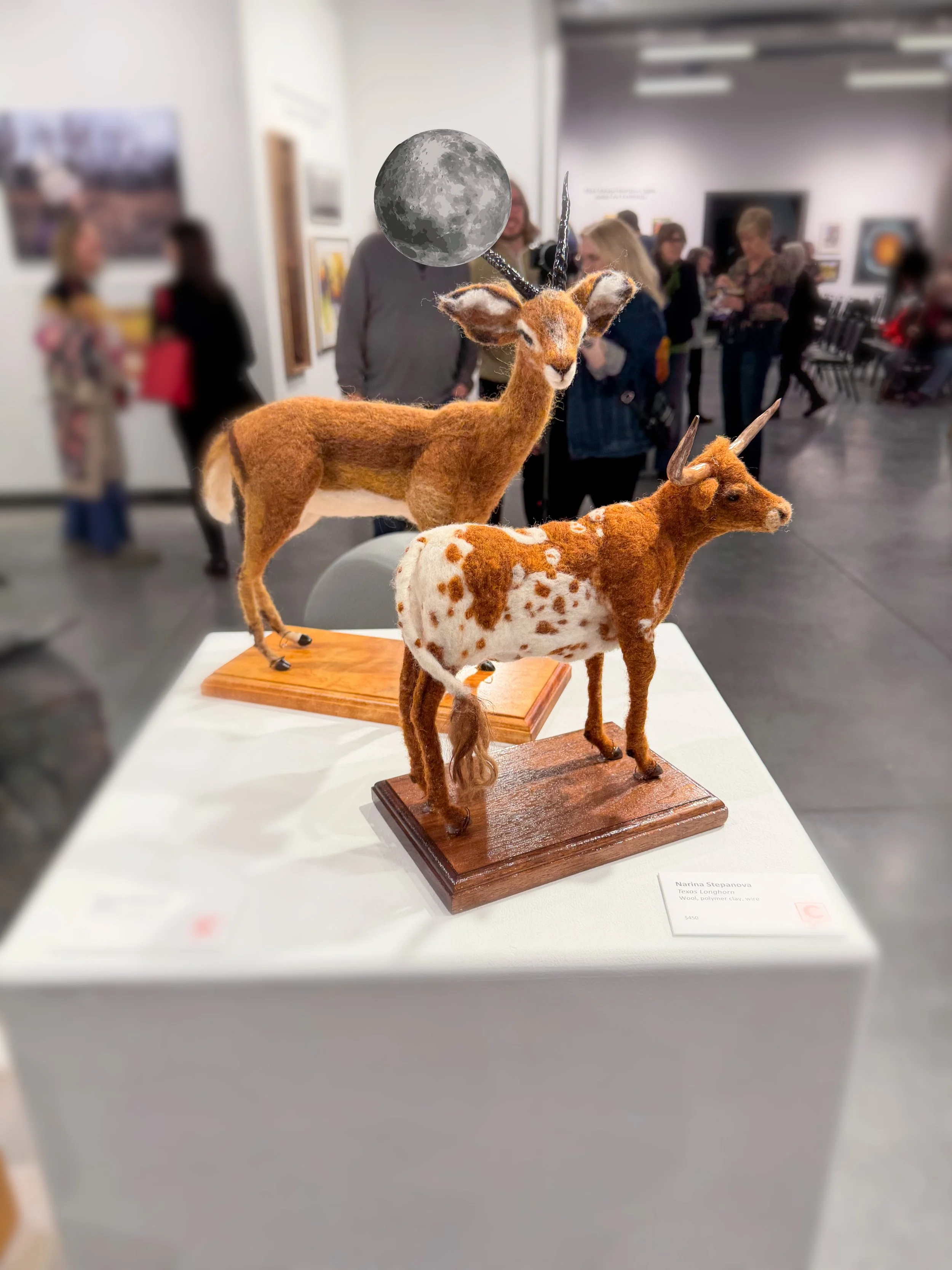 Needle-felted Impala and Texas Longhorn displayed at Northern Light Art Exhibition.