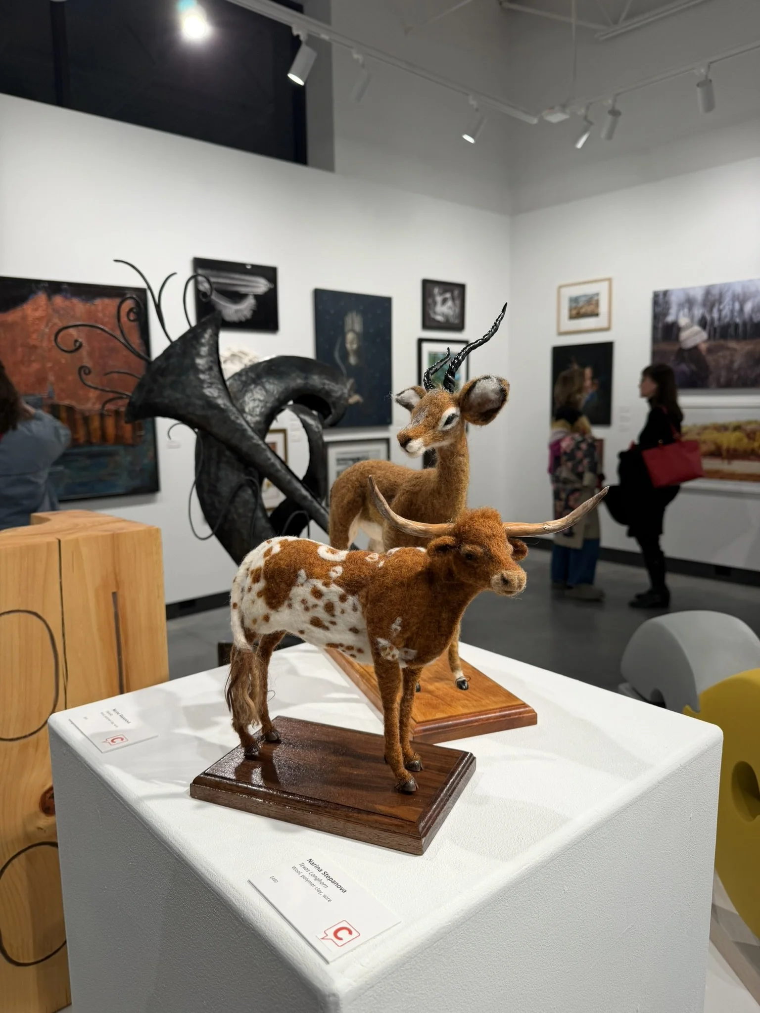 Needle-felted Impala and Texas Longhorn displayed at Northern Light Art Exhibition.