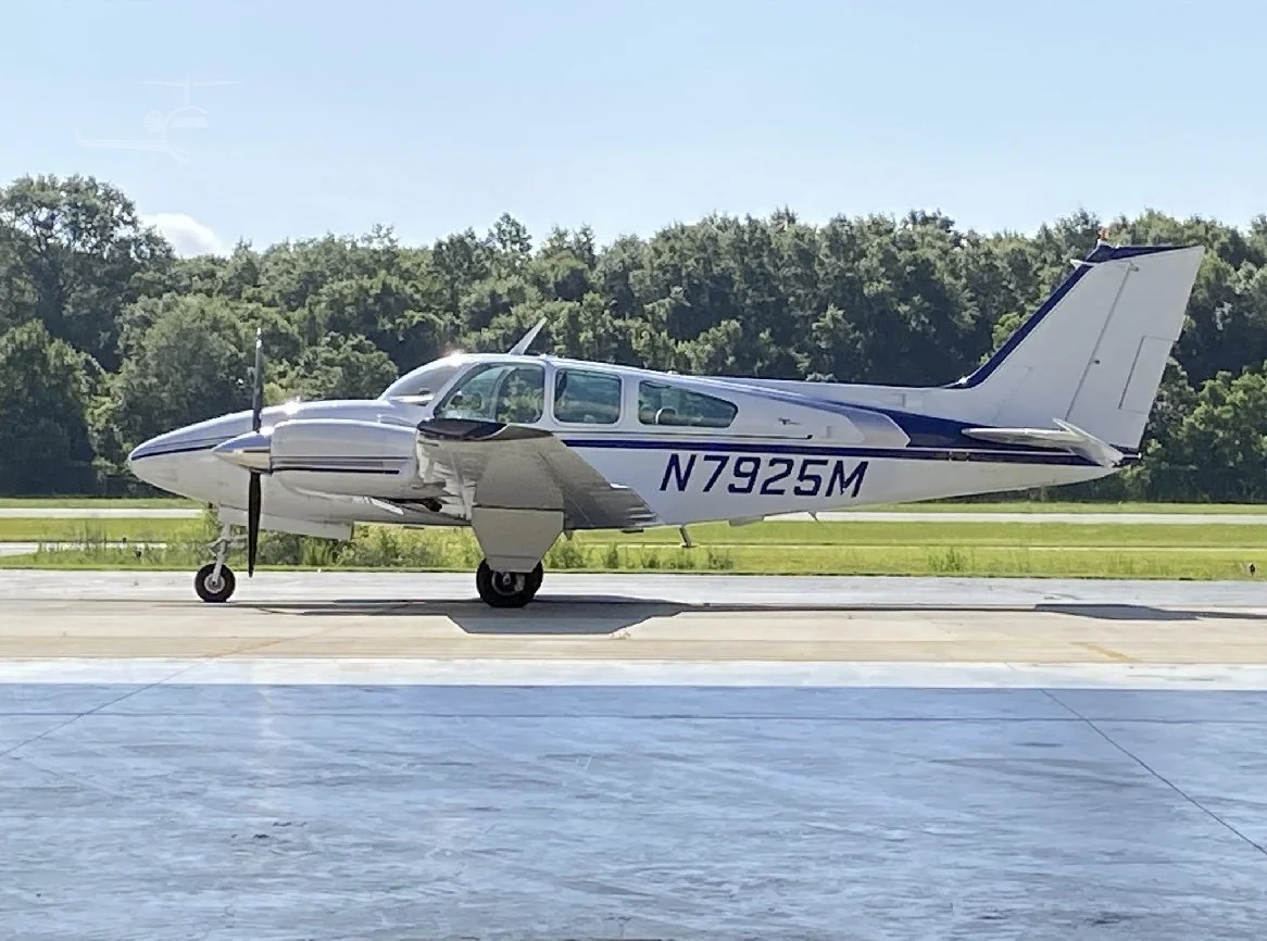 Baron N925M on a runway. WETSU Aviation, Colorado Springs