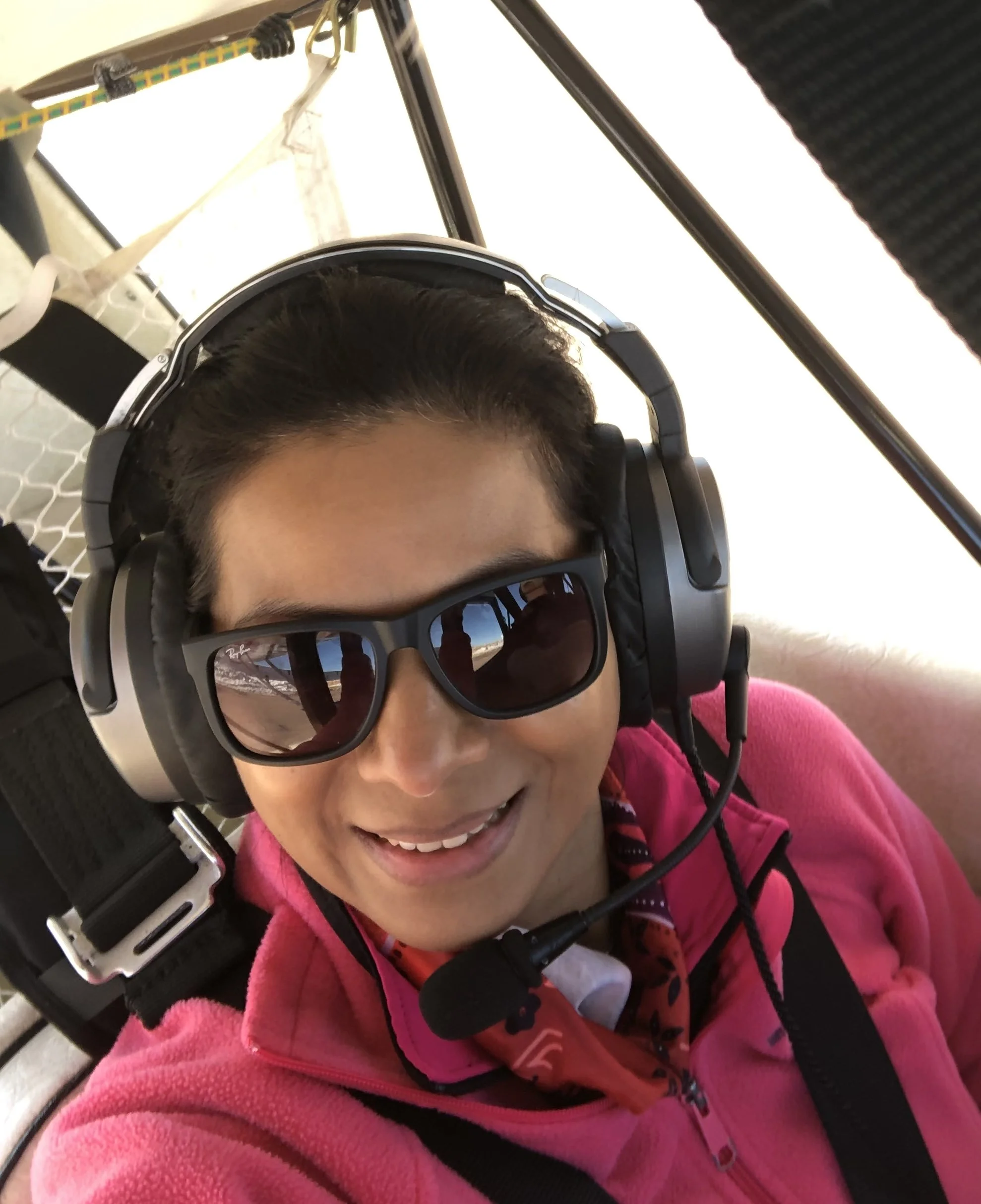 Dian Oatman enjoying a fun ride in the American Champion Super Decathlon N2JG over Colorado Springs