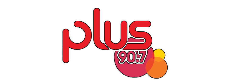 Radio station logo with the text 'Plus 90.7' and colorful circles in the background.