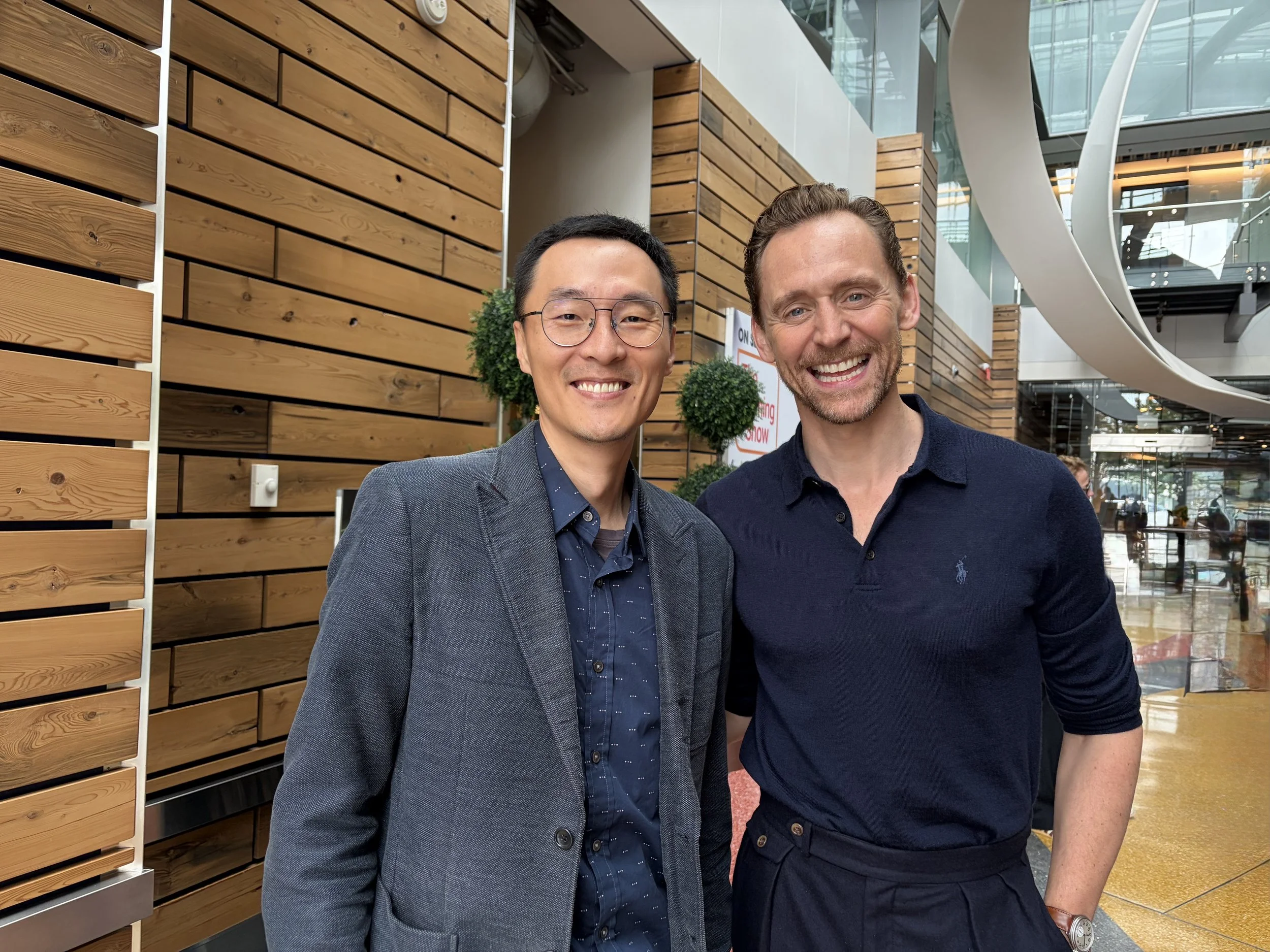 Rony Gao providing interpretation during the Toronto International Film Festival (TIFF) in September 2026 to support crew members of Apple TV's feature film "Tenzing", including English Actor Tom Hiddleston, best known for playing the villainous char