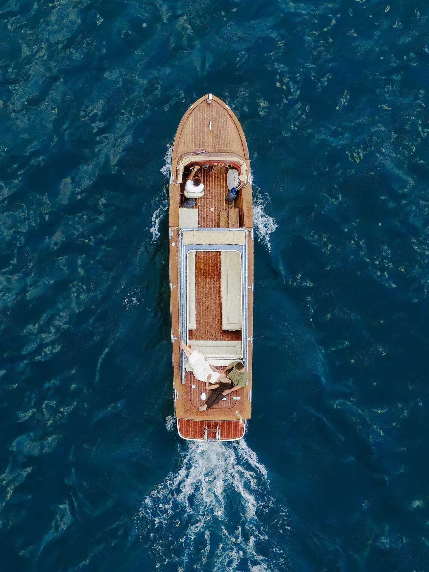 Part II from Elizabeth &amp; Jeremy&rsquo;s Lago Di Como proposal! A sunset boat ride around the lake, the world&rsquo;s best Aperol spritz at @ghtlakecomo , and an evening sitting underneath orange and white striped umbrellas talking about all my an