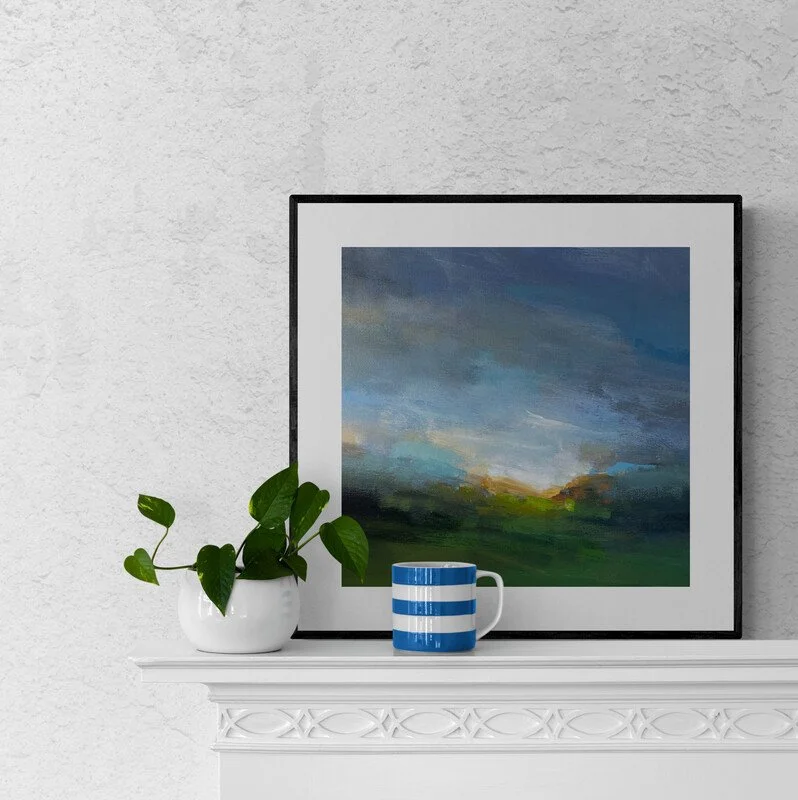 Distant Clouds abstract landscape painting on fireplace with plant and a mug