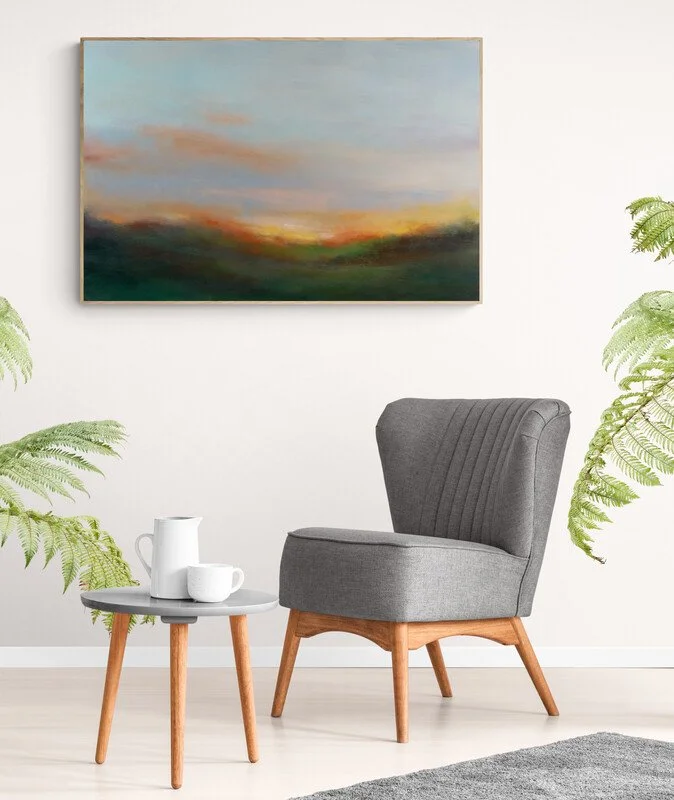 Sunset Cadenza large impressionist and abstract green, orange and blue sunset canvas painting now sold over living room chair and coffee table