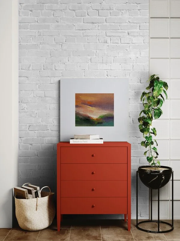 room-with-a-colorful-chest-of-drawers-with-mounted-artjpg.jpg