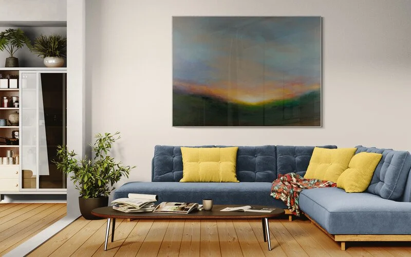 Large impressionist sunrise canvas painting Spring Awakening above a sofa in a living room