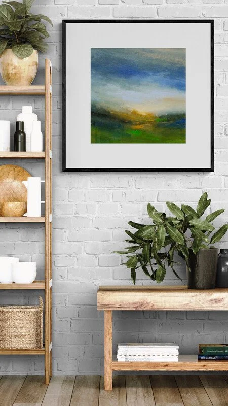 Rustic Breeze painting hanging above a console table and plant