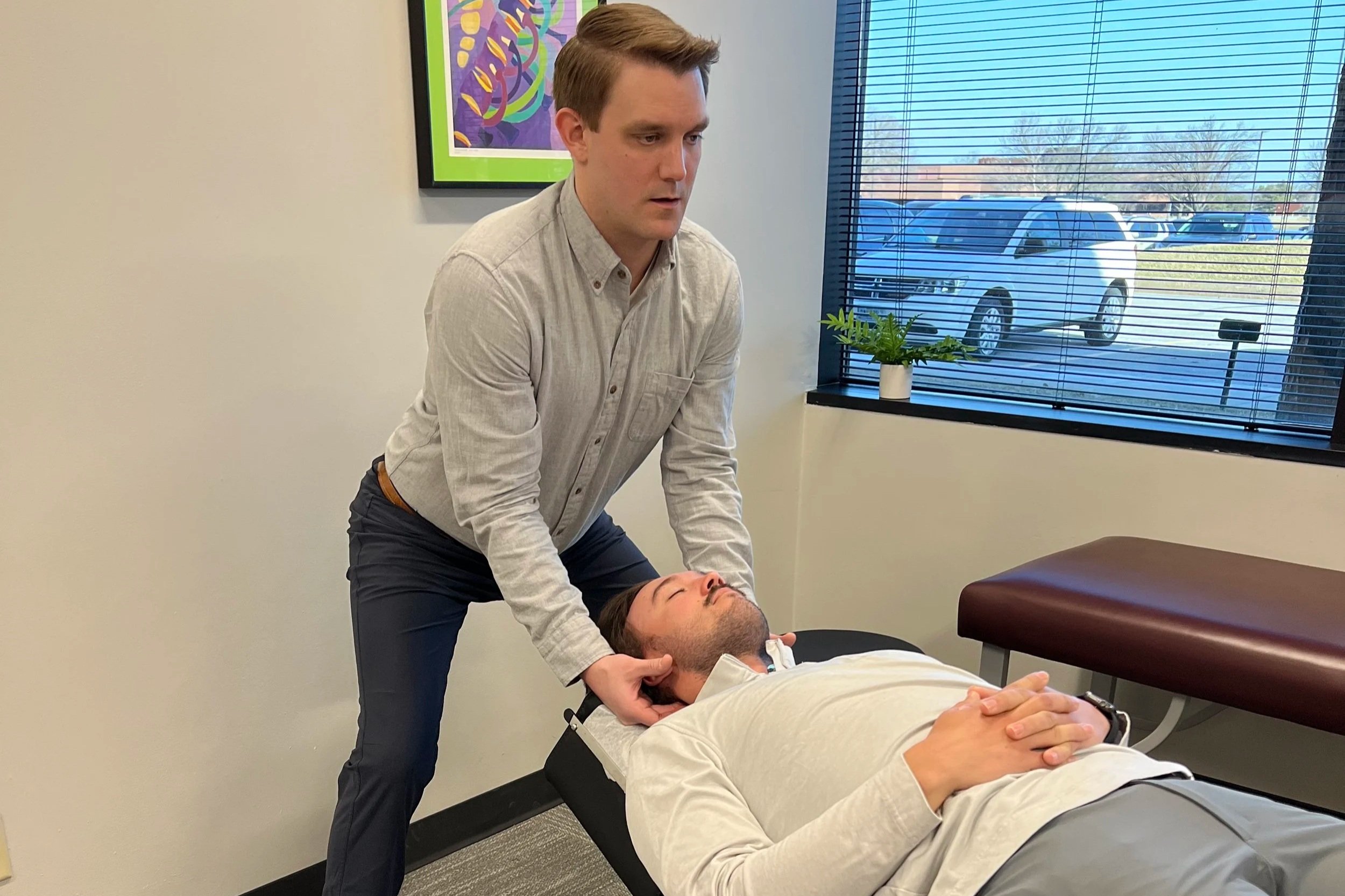 Dr. Fordyce Performing A Chiropractic Neck Adjustment