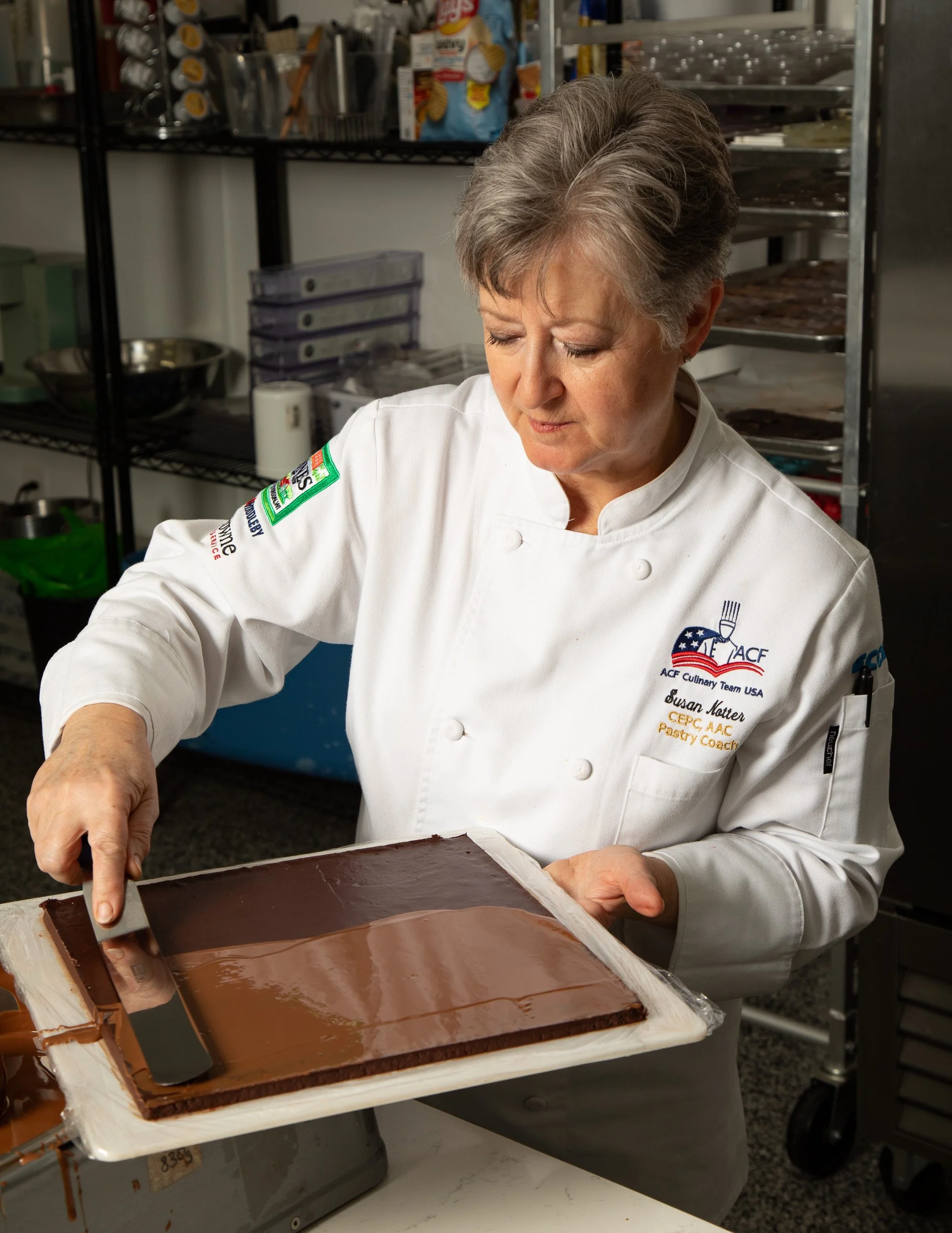 Spreadung chocolate on slab ganache.jpg