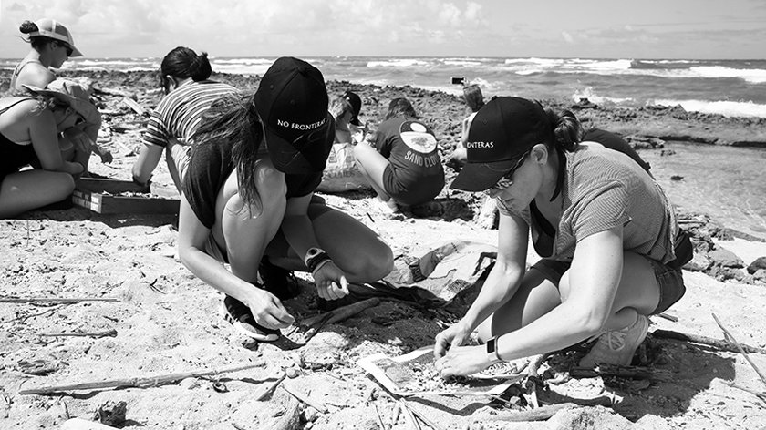 Crew-sift-for-micro-plastics-eXXpedition-North-Pacific-2018---pre-voyage-crew-beach-clean-up-with-Sustainable-Coastlines-Hawaii-in-Hawaii-23-June-(c)-exxpedition-and-Eleanor-Church.jpg